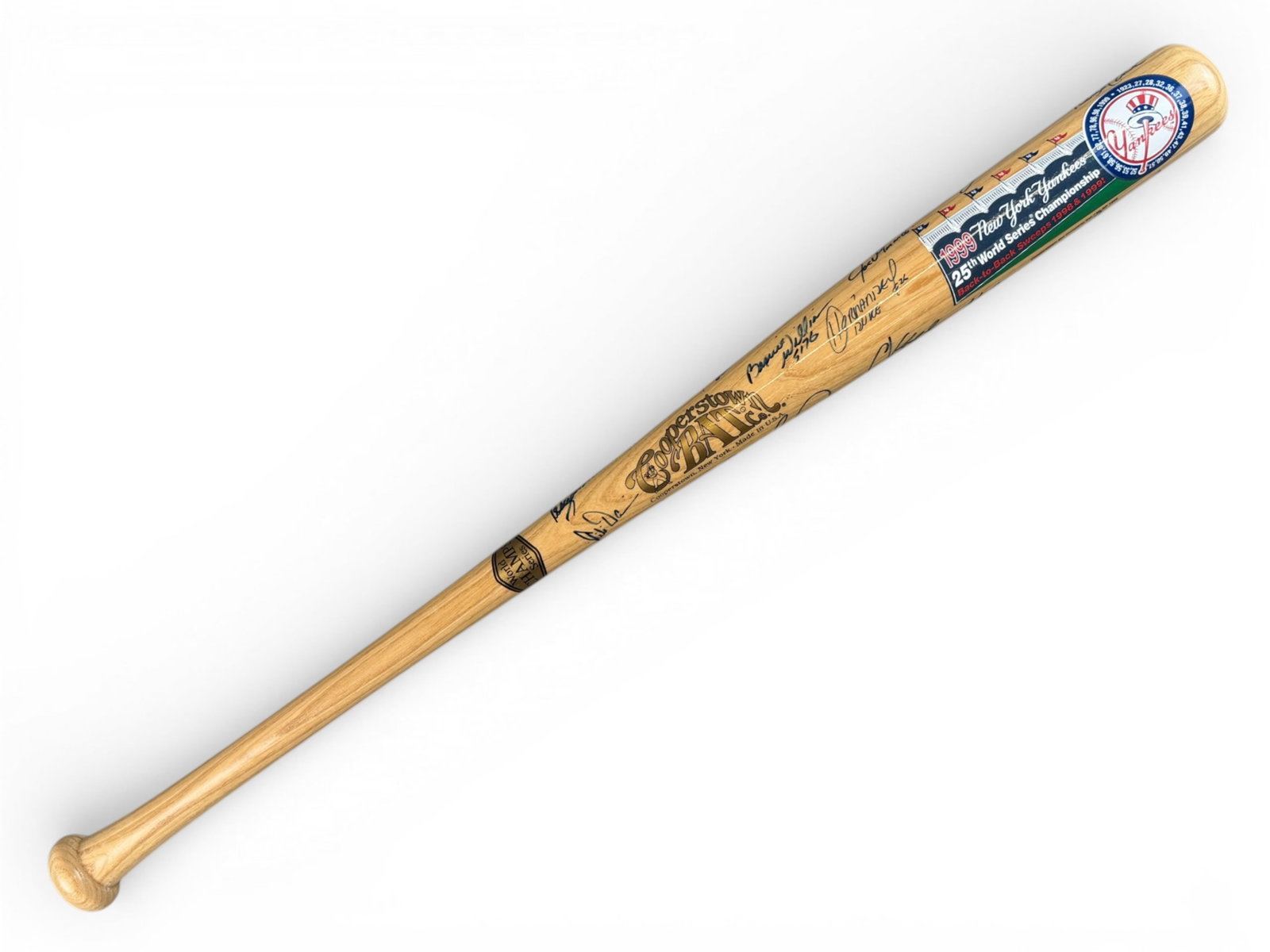 1999 NY Yankees Team Signed Baseball Bat: Offered is a World Series Cooperstown Bat, featuring approx. 24 signatures including: Derek Jeter, Joe Torre, Bernie Williams, David Cone, Paul O'Neill, Willie Randolph, Jorge Posada, Mariano Rivera, 