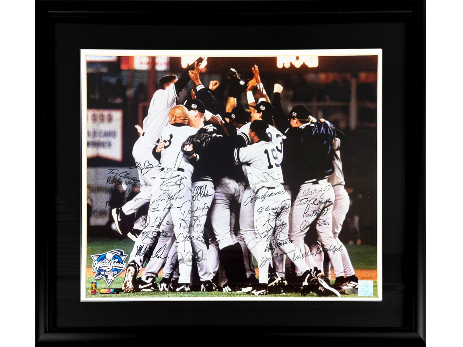 2000 NY Yankees Team Signed Photo: Offered is a 2000 New York Yankees World Series Champion Team Signed Photo, featuring approx. 24 signatures. Limited edition of 350. Includes: Derek Jeter, Willie Randolph, Andy Pettitte, Paul O'Neill