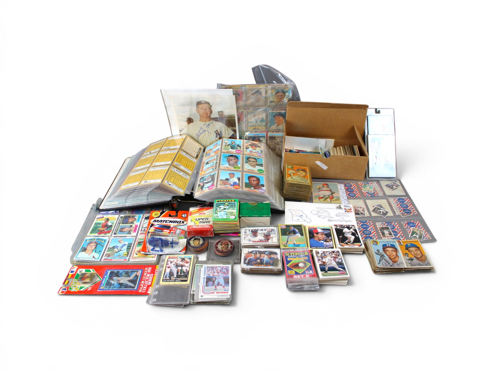 Estate Baseball Card Collection 1930s-Modern: Estate baseball card collection housed in a large binder with additional loose cards. Binder includes mostly 1960s cards with a handful of low grade 1930s-1940s cards, all early cards photographed. Al