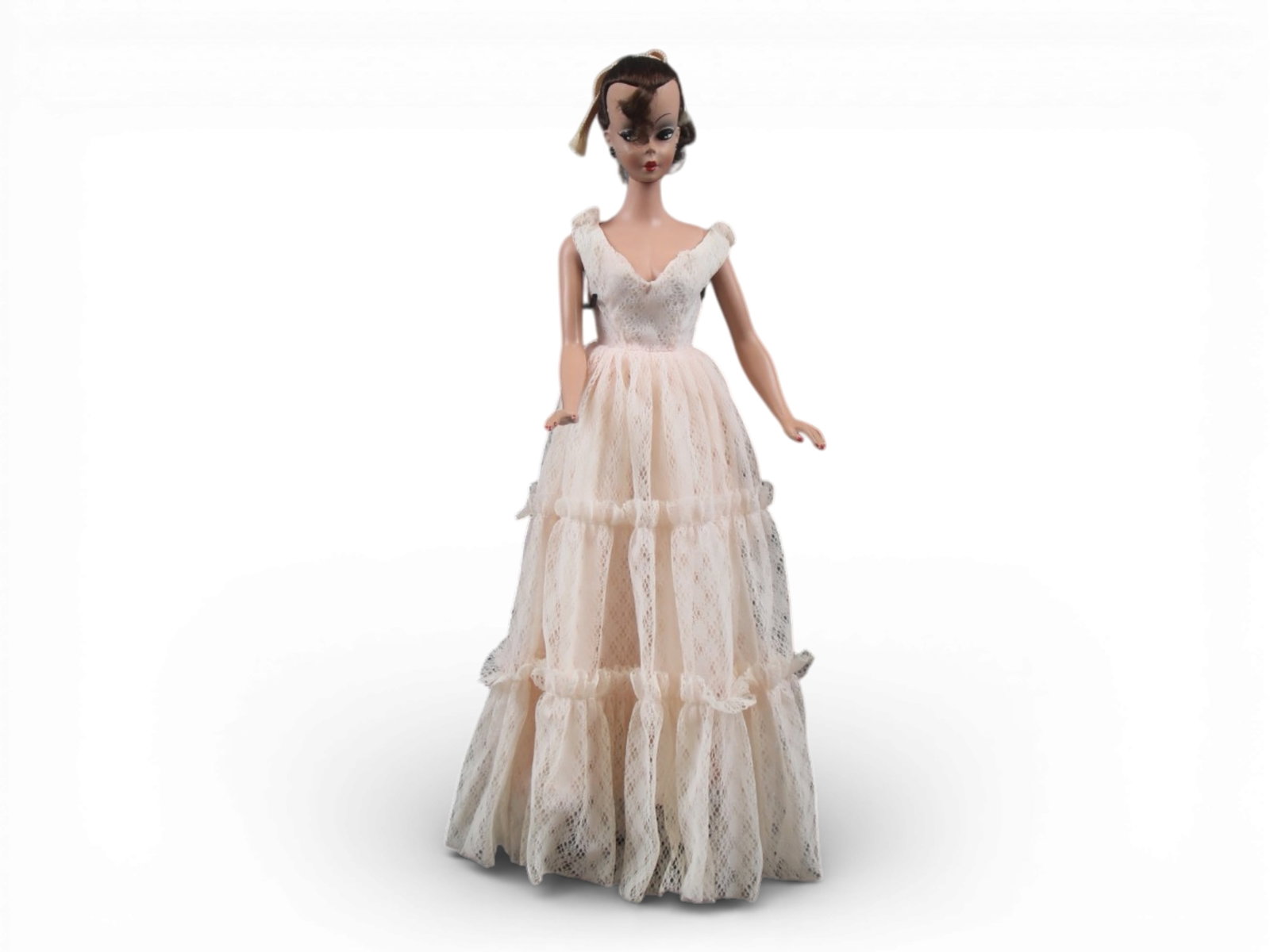 Original German Bild Lilli Doll, 11-1/2", Brunette: German "Bild Lilli", 11-1/2" doll with molded and painted facial features, side-glancing eyes with molded lashes, high arched eyebrows, brunette inset wig styled in a ponytail with curl on her forehea