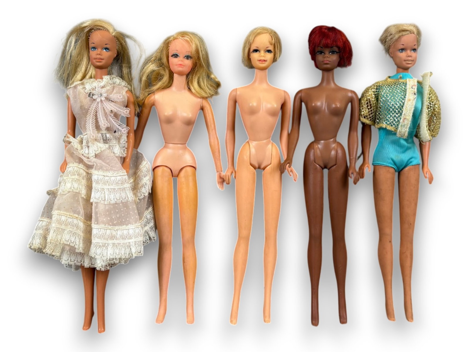 (5) Barbie Dolls: Group including Julia, Live Action PJ, Stacey, and two Malibu Barbies. Circa 1970s. Shipping: Weiss Auctions offers full-service, in-house shipping for nearly all items in this auction. For a shipping