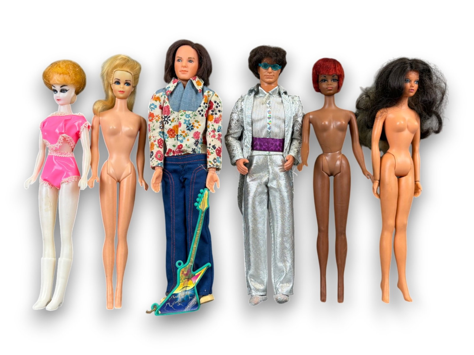 (6) Fashion Dolls: Group including Truly Scrumptious Barbie, Ken, Tuesday Taylor, and others. Circa 1960s-1990s. Shipping: Weiss Auctions offers full-service, in-house shipping for nearly all items in this auction. For 