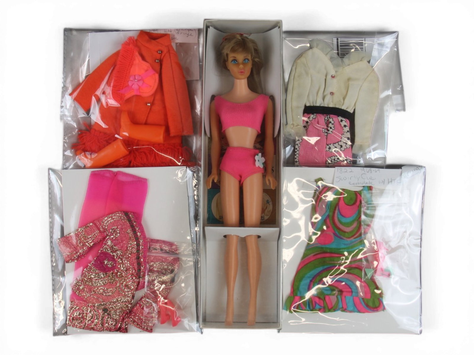 1967 Standard Barbie #1190 & (4) Fashion Outfits: Includes Vintage 1967 #1190 Standard Barbie with two piece hot pink suit, straight legs, and booklet, (4) vintage Fashion outfits including 1968-69 #1822 "Swirly Cue" with multi color dress, pink clos