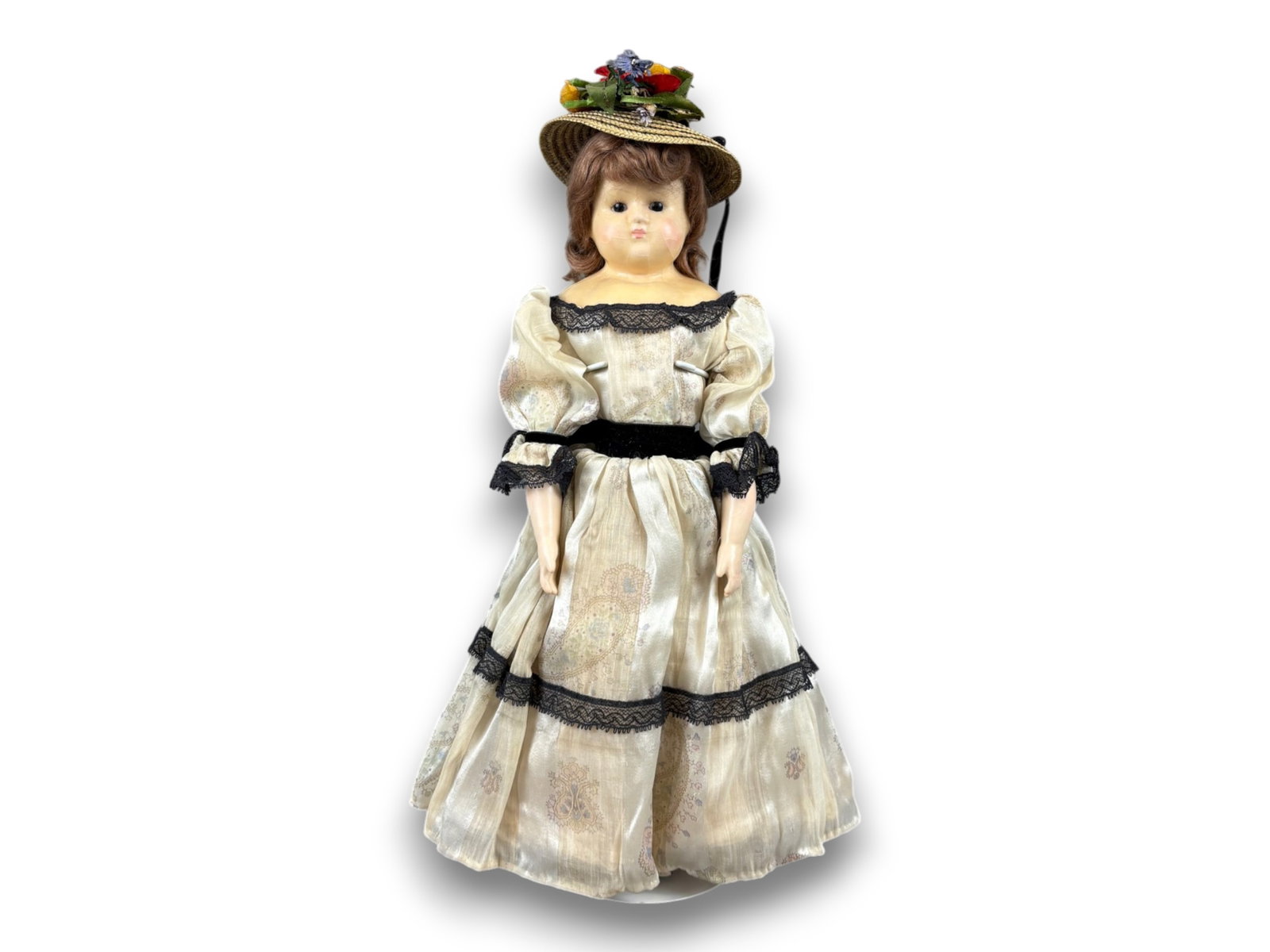 Antique Wax Doll: 17 inch wax over papier mache shoulder plate head with composition limbs and silk dress. Circa 1860s-1870s. Shipping: Weiss Auctions offers full-service, in-house shipping for nearly all items in this