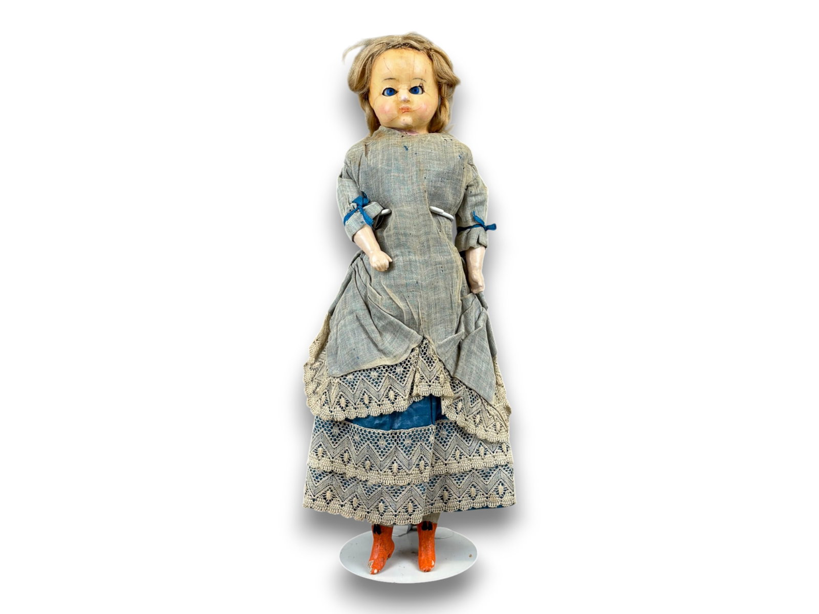 Antique Wax Doll: 16.5 inch wax over papier mache shoulder head on cloth body with original dress and wig. Circa 1860s-1870s. Shipping: Weiss Auctions offers full-service, in-house shipping for nearly all items in this