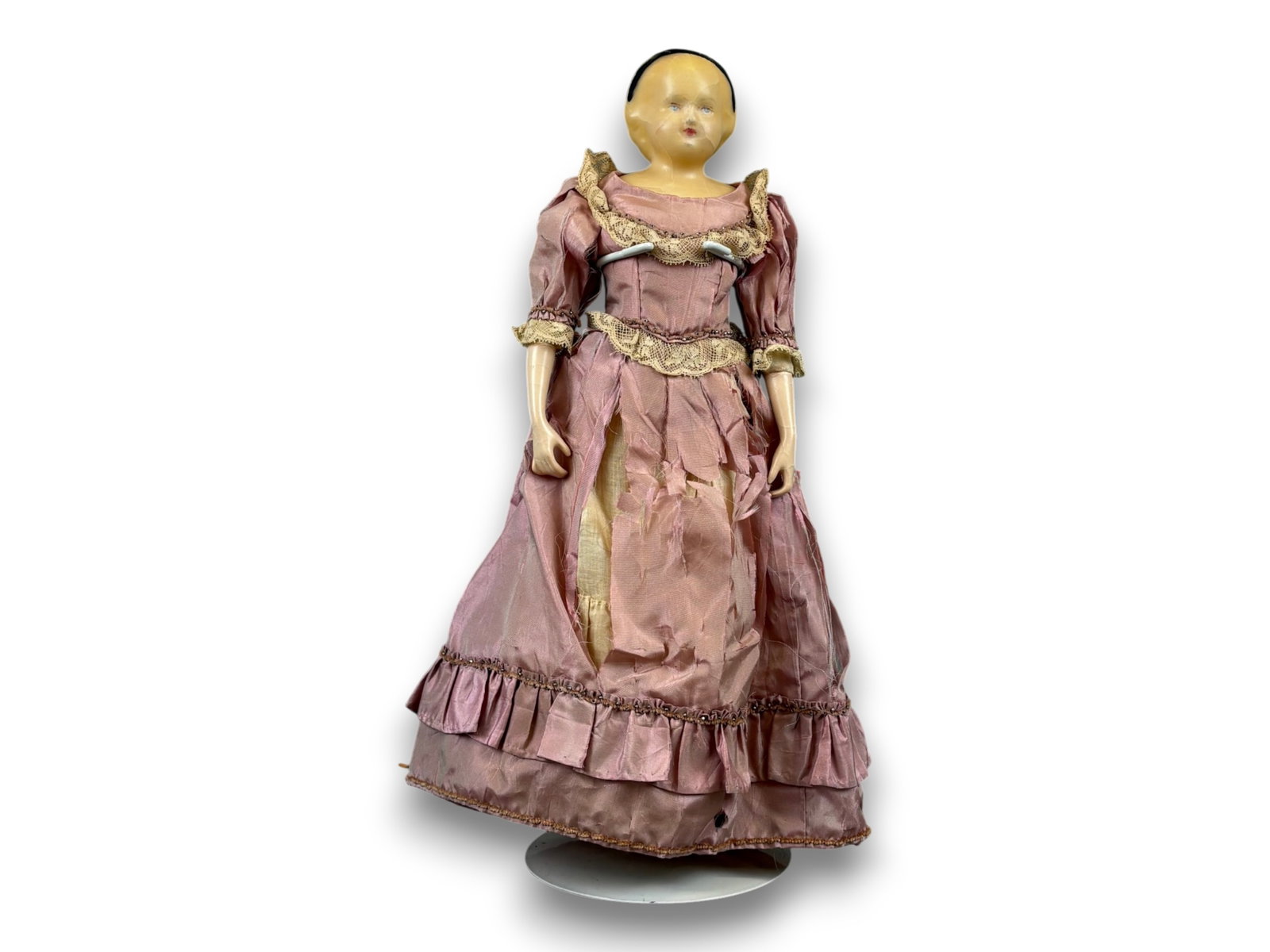 Antique Wax Doll: 13 inch wax over papier mache shoulder head with original dress. Circa 1860s. Shipping: Weiss Auctions offers full-service, in-house shipping for nearly all items in this auction. For a shipping quote