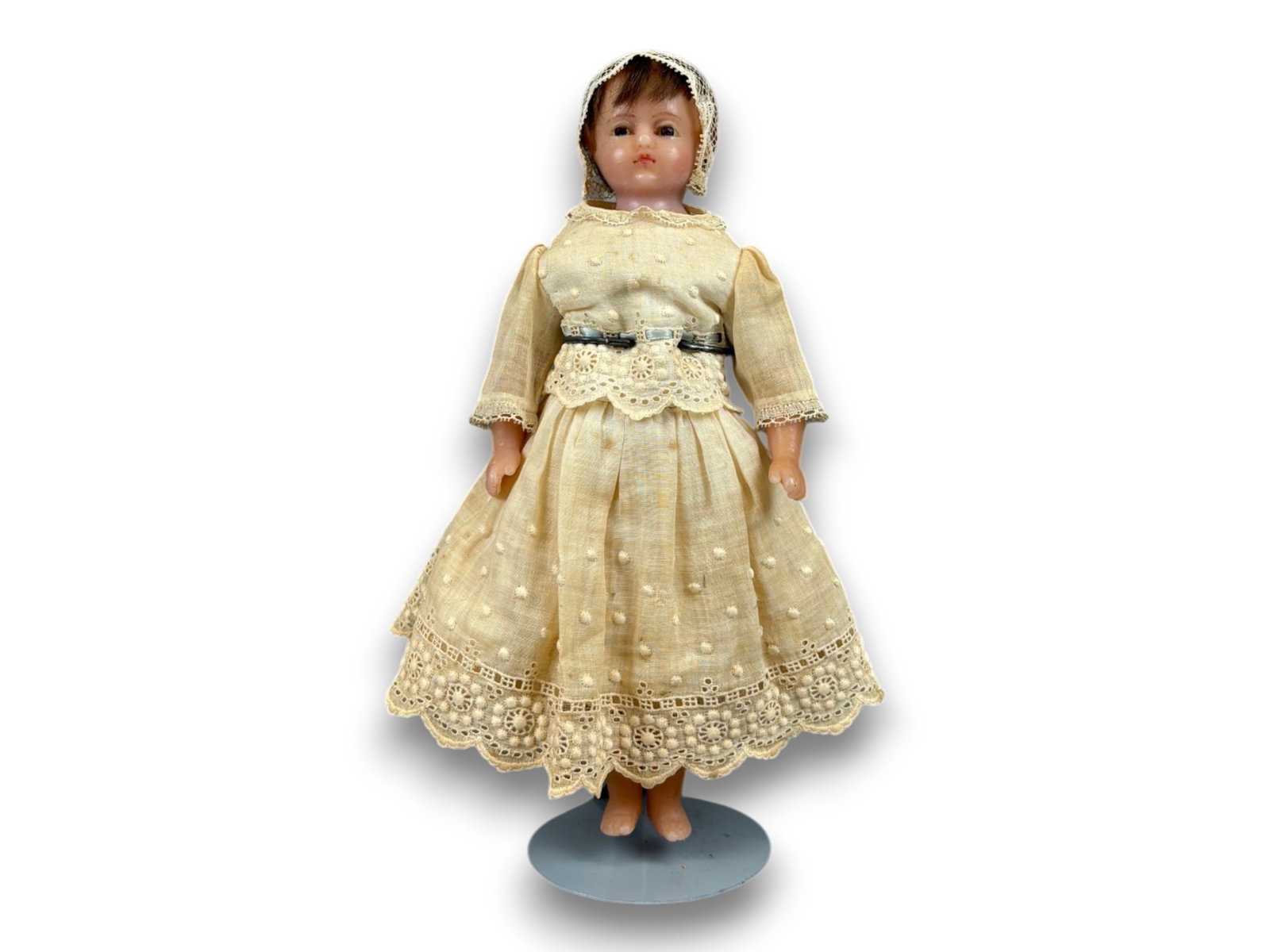 Poured Wax Antique Doll: 9 inch poured wax doll on cloth body, all original. Circa 1850. Shipping: Weiss Auctions offers full-service, in-house shipping for nearly all items in this auction. For a shipping quote, please conta
