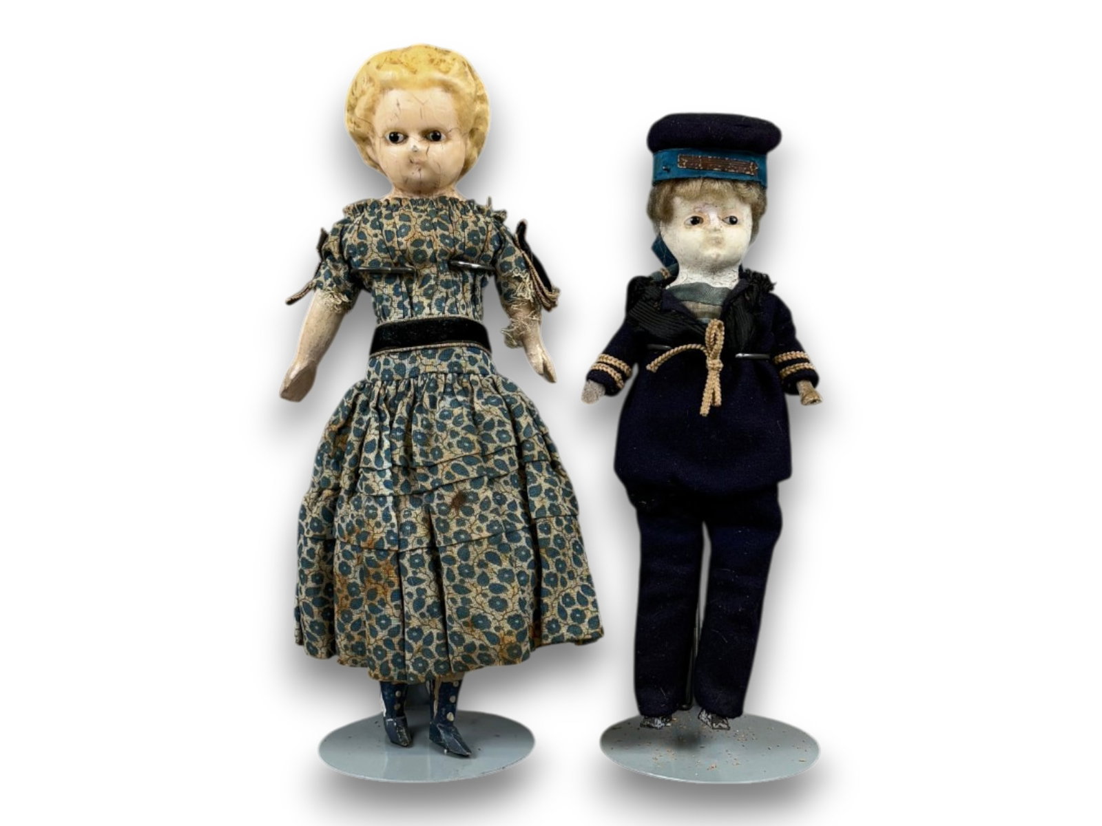 (2) Antique Wax Dolls: Two wax over papier mache dolls with wooden limbs. Circa 1860s. Shipping: Weiss Auctions offers full-service, in-house shipping for nearly all items in this auction. For a shipping quote, please conta