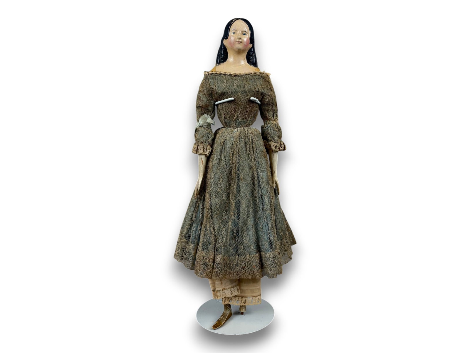 Milliner's Model Papier Mache Doll: 17 inch papier mache shoulder head doll with carved limbs. Circa 1840s. Shipping: Weiss Auctions offers full-service, in-house shipping for nearly all items in this auction. For a shipping quote, plea