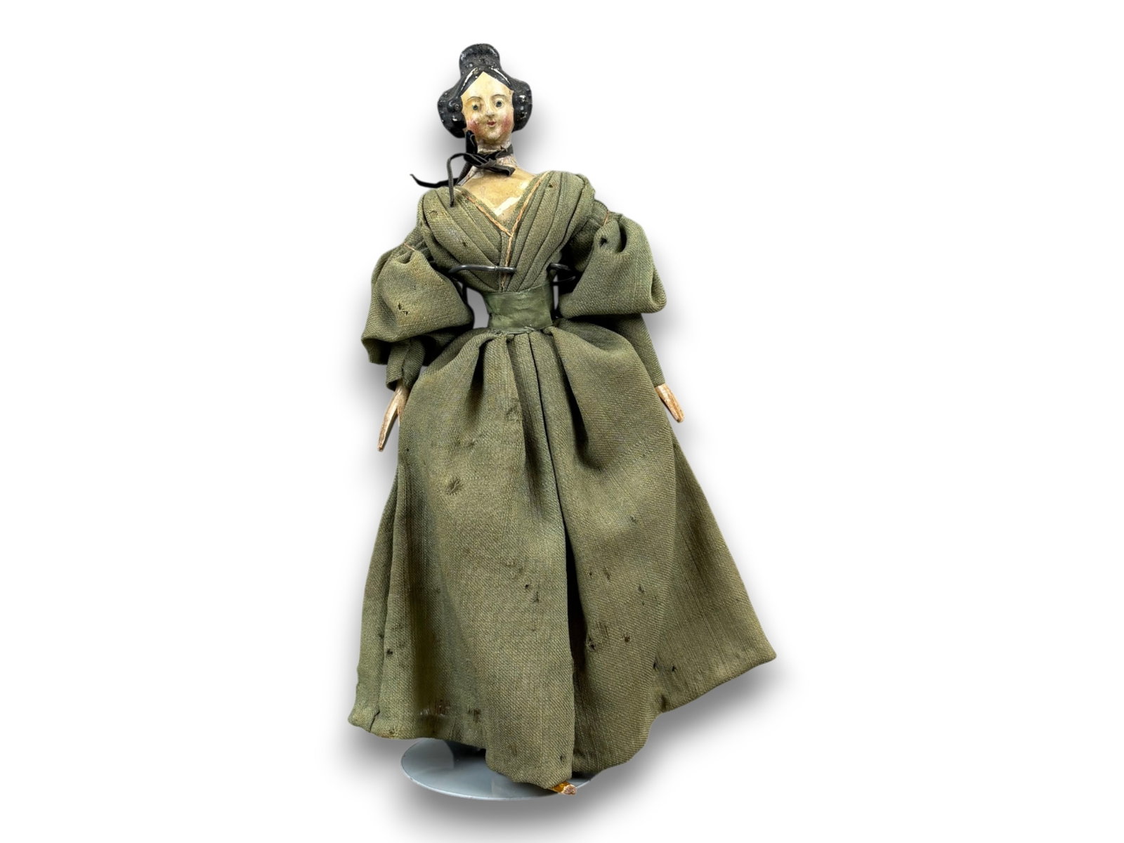 Milliner's Model Papier Mache Doll: 11.5 inch papier mache shoulder head doll with carved limbs. Circa 1840s. Shipping: Weiss Auctions offers full-service, in-house shipping for nearly all items in this auction. For a shipping quote, pl