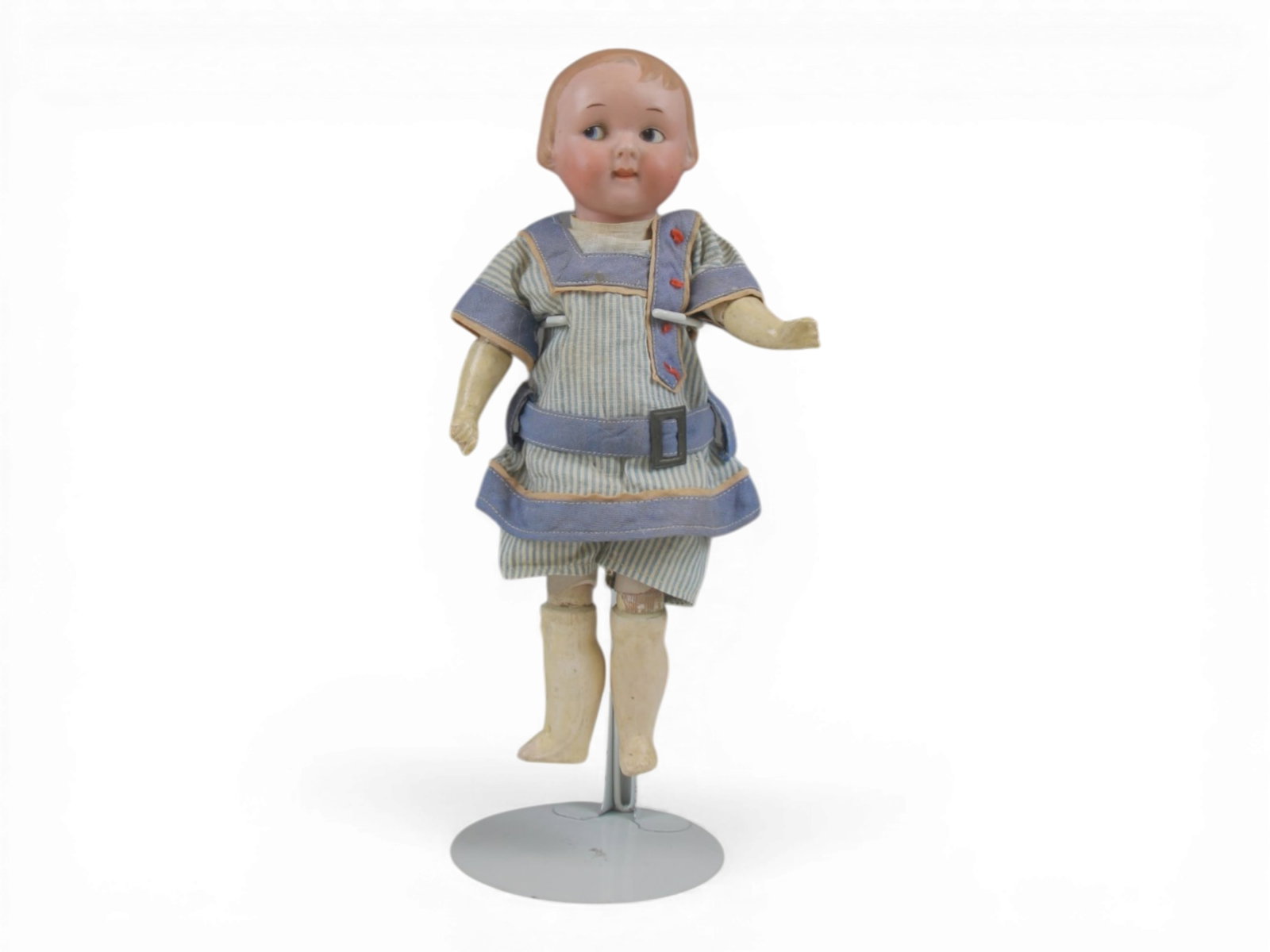 Armand Marseille 210 Bisque Doll: 11.5 inch bisque head on composition body with original costume. Circa 1920s. Shipping: Weiss Auctions offers full-service, in-house shipping for nearly all items in this auction. For a shipping quote