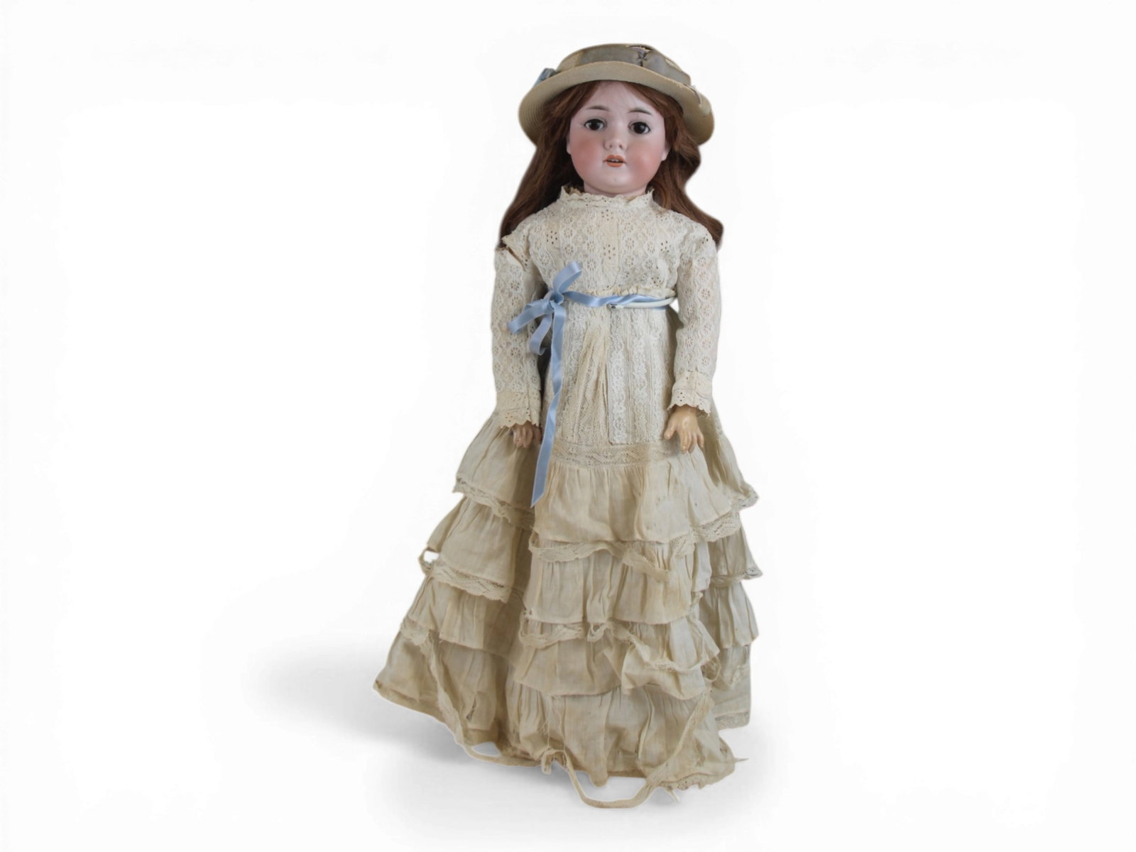 C.M. Bergmann 1916 Bisque Doll: 25 inch bisque socket head on fully jointed composition and wood body. Circa 1916. Shipping: Weiss Auctions offers full-service, in-house shipping for nearly all items in this auction. For a shipping 