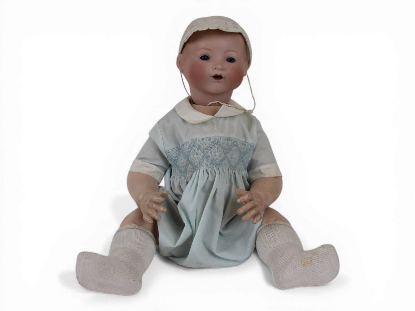 Armand Marseille 351 Baby Doll: 23 inch bisque socket head on composition baby body. Some teeth missing. Circa 1920s. Shipping: Weiss Auctions offers full-service, in-house shipping for nearly all items in this auction. For a shippi