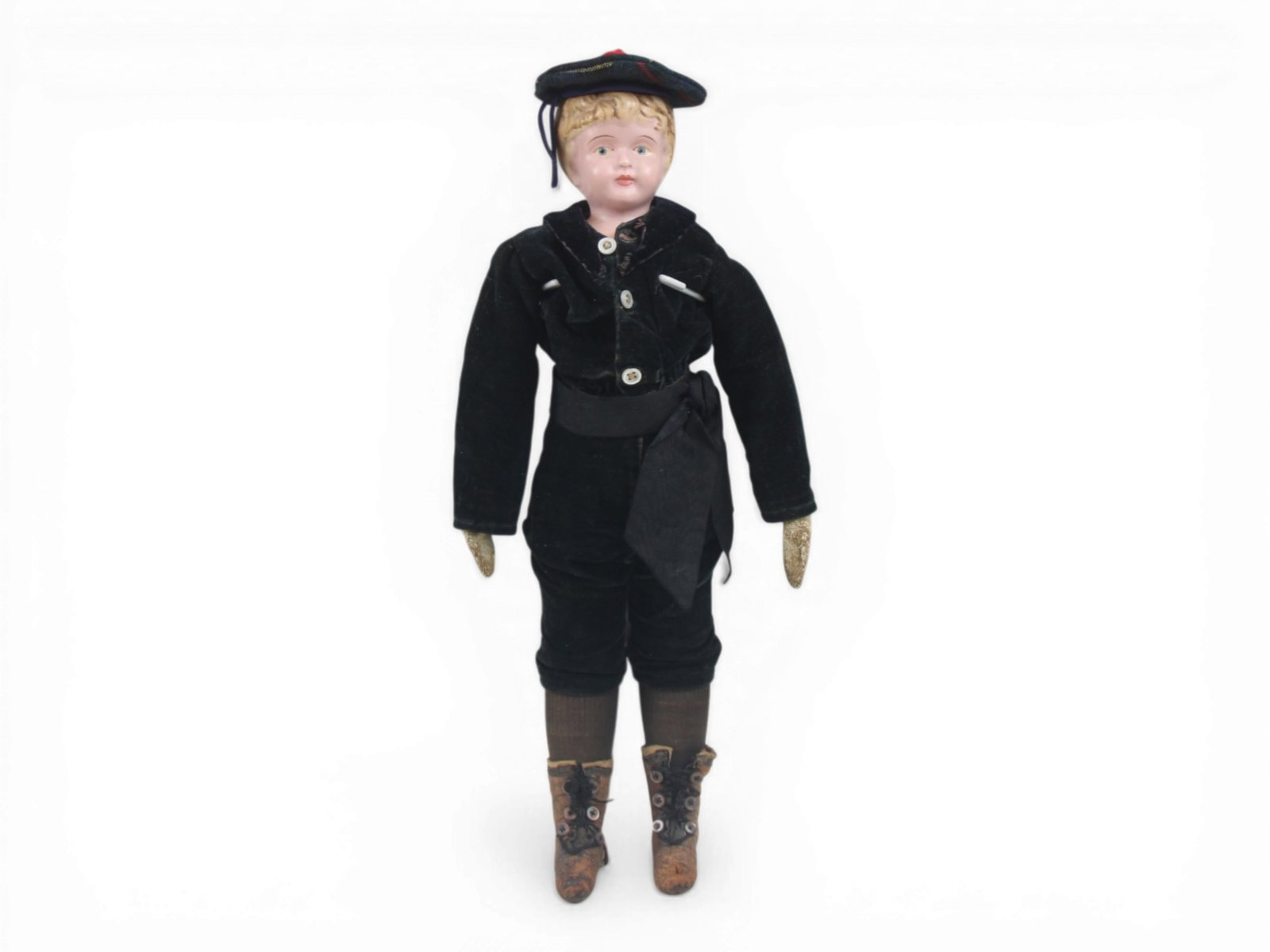 German Tin Head Antique Doll: 16.5 inch German tin head doll with cloth body and kid arms in boy costume. Circa 1880. Shipping: Weiss Auctions offers full-service, in-house shipping for nearly all items in this auction. For a