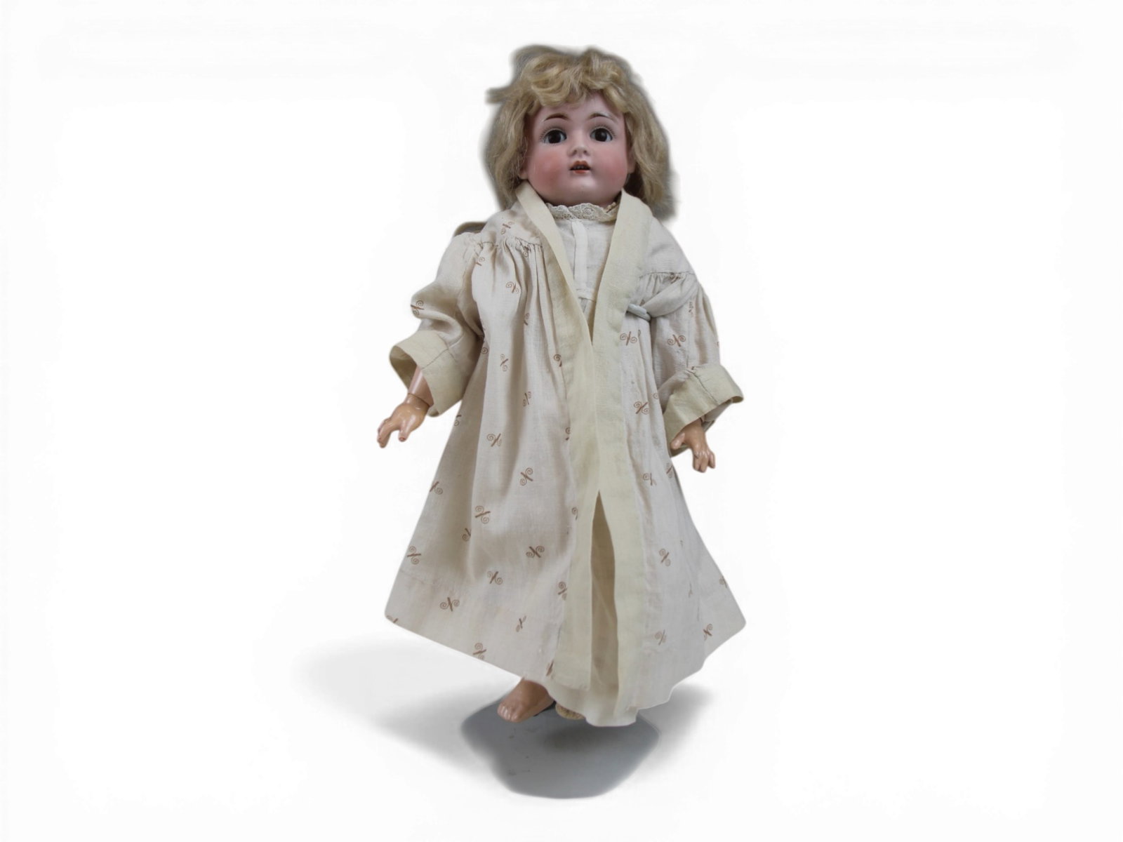 Kestner 167 Bisque Head Doll: 13.5 inch bisque socket head doll on fully jointed composition body. Circa 1890. Shipping: Weiss Auctions offers full-service, in-house shipping for nearly all items in this auction. For a shipping qu