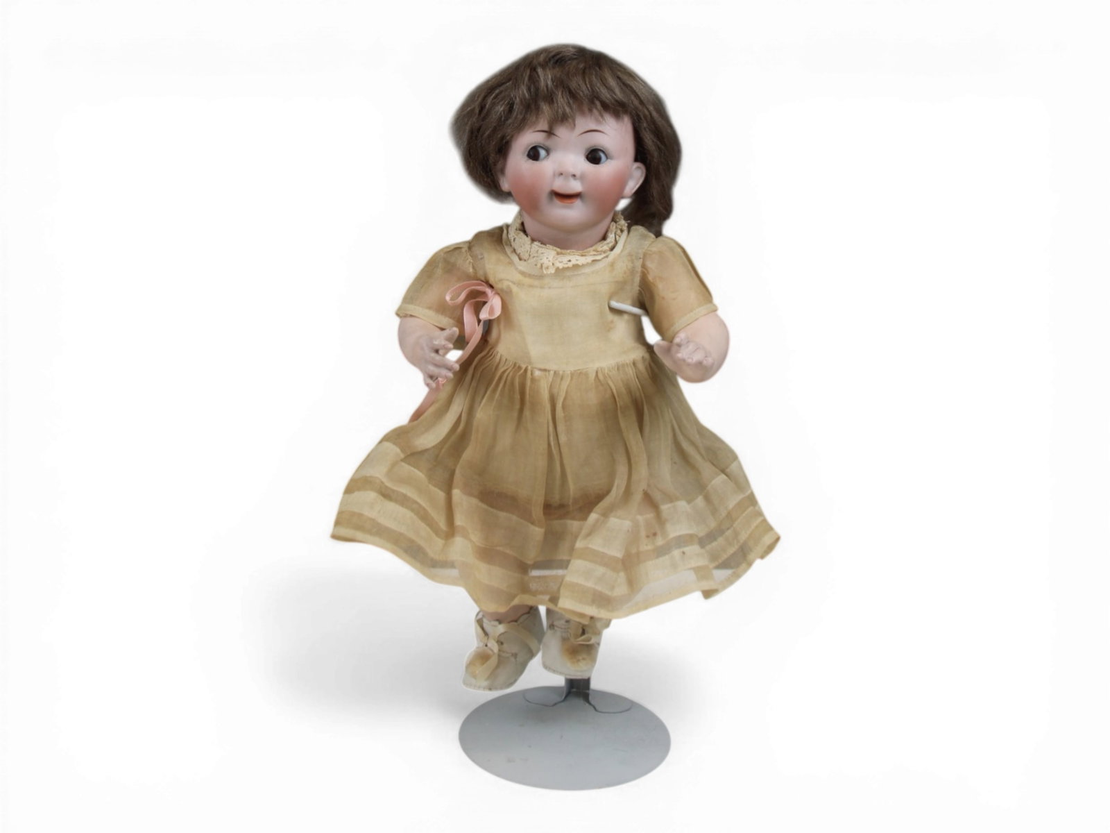 Hertel Schwab Googly Character Doll: 13 inch Hertel, Schwab & Co. bisque socket head googly doll on composition baby body with side glancing eyes and watermelon mouth. Circa 1910. Shipping: Weiss Auctions offers full-service, in-house