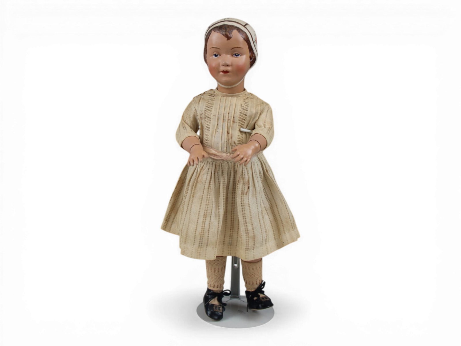 Schoenhut Wooden Doll: 16.5 inch fully articulated wooden Schoenhut doll with restored painted head. Circa 1911-1930. Shipping: Weiss Auctions offers full-service, in-house shipping for nearly all items in this auction. For