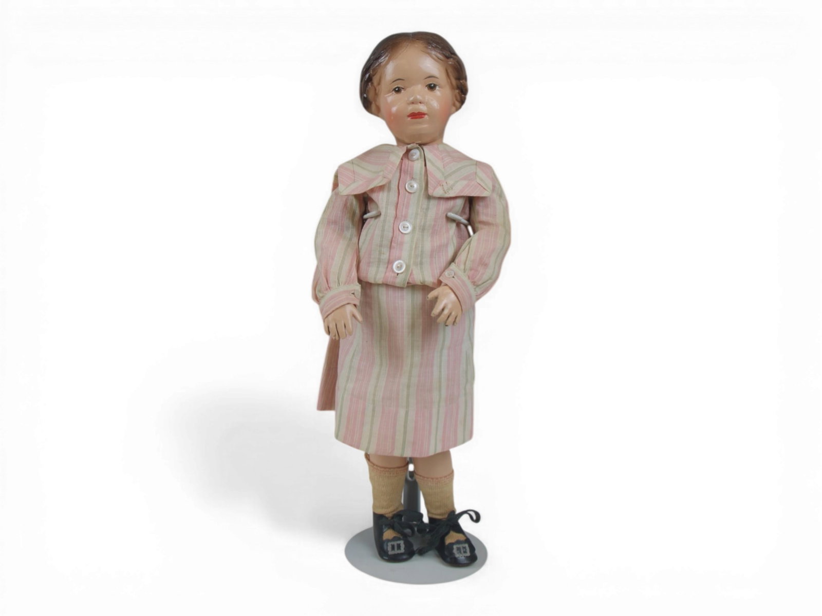 Schoenhut Wooden Doll: 16 inch fully articulated wooden Schoenhut doll with molded braided hair and possible original dress. Circa 1911-1930. Shipping: Weiss Auctions offers full-service, in-house shipping for nearly all it