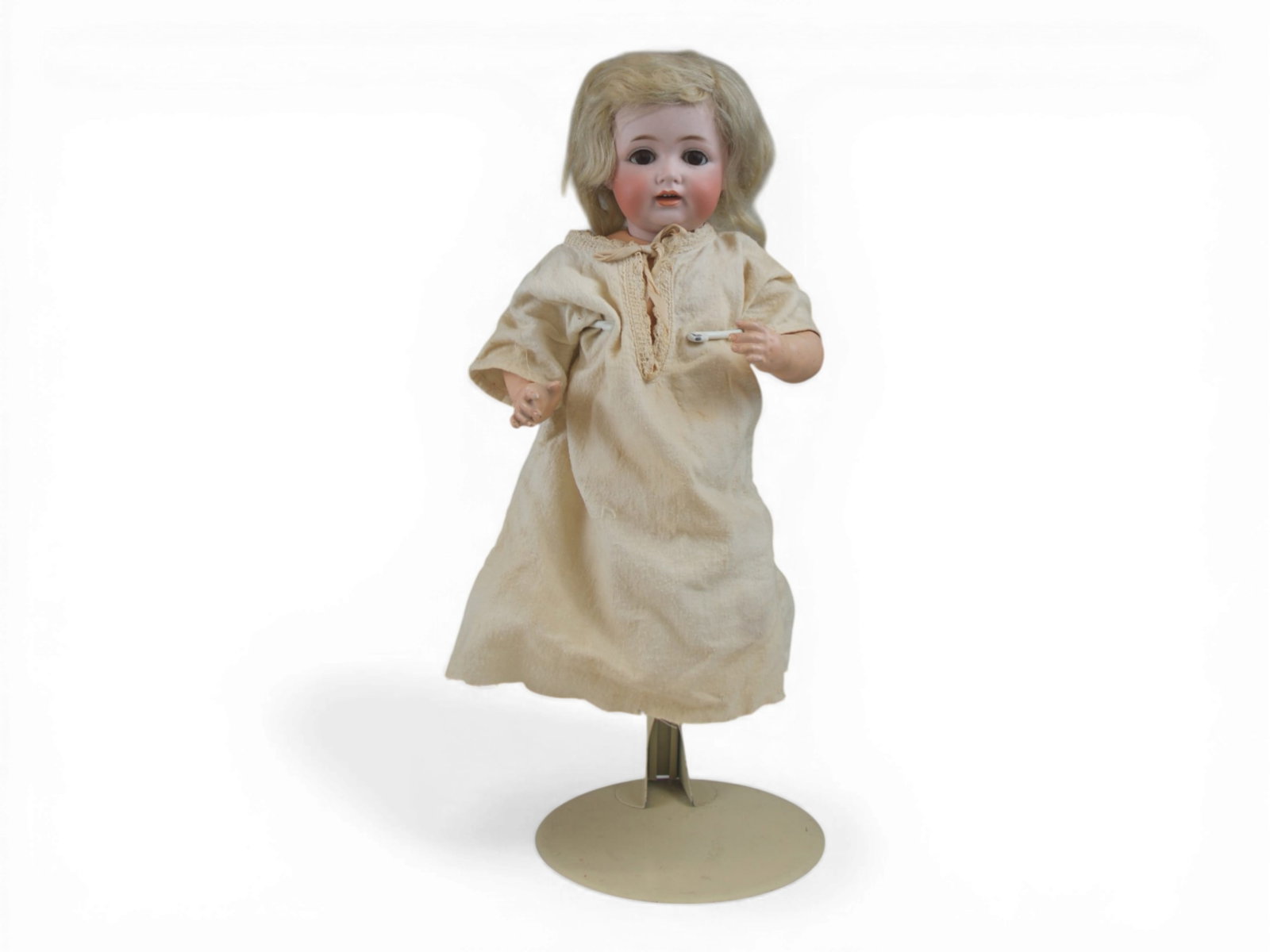 JD Kestner 260 Character Baby Doll: 18 inch bisque character socket head on bent limb composition baby body. Circa 1915. Shipping: Weiss Auctions offers full-service, in-house shipping for nearly all items in this auction. For a