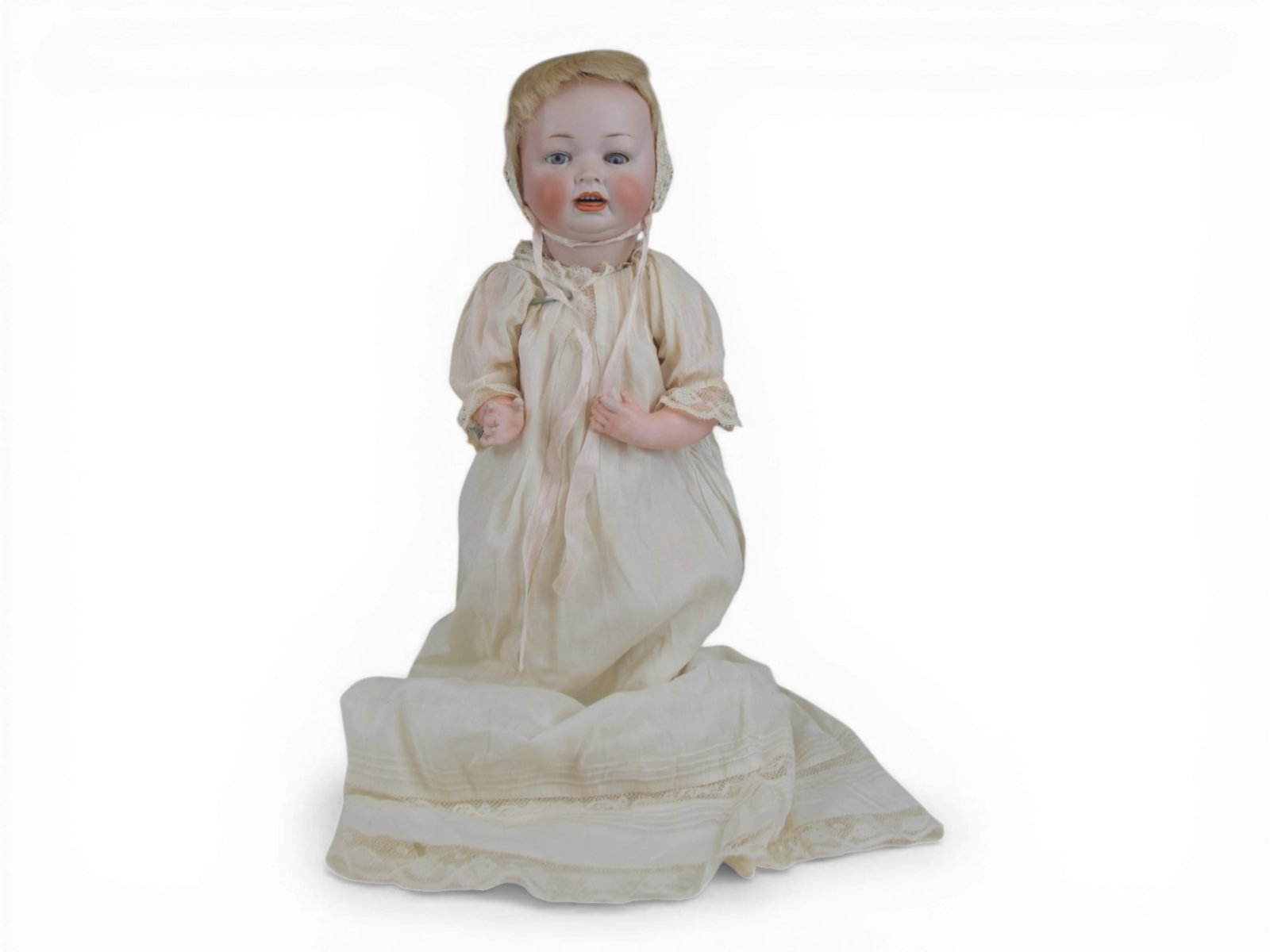 Louis Wolfe & Co. 152 Baby Doll: 16 inch bisque character socket head on bent limb composition baby body. Circa 1915. Shipping: Weiss Auctions offers full-service, in-house shipping for nearly all items in this auction. For a