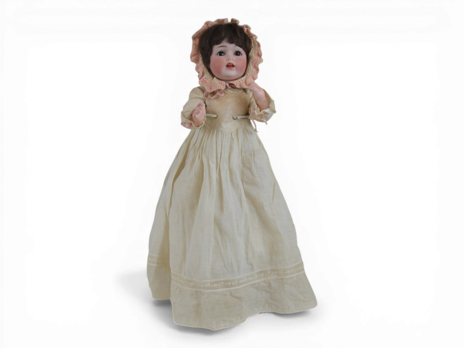 JD Kestner 257 Bisque Head Doll: 16 inch bisque socket head on bent limb composition body. Circa 1920s. Shipping: Weiss Auctions offers full-service, in-house shipping for nearly all items in this auction. For a shipping quote,