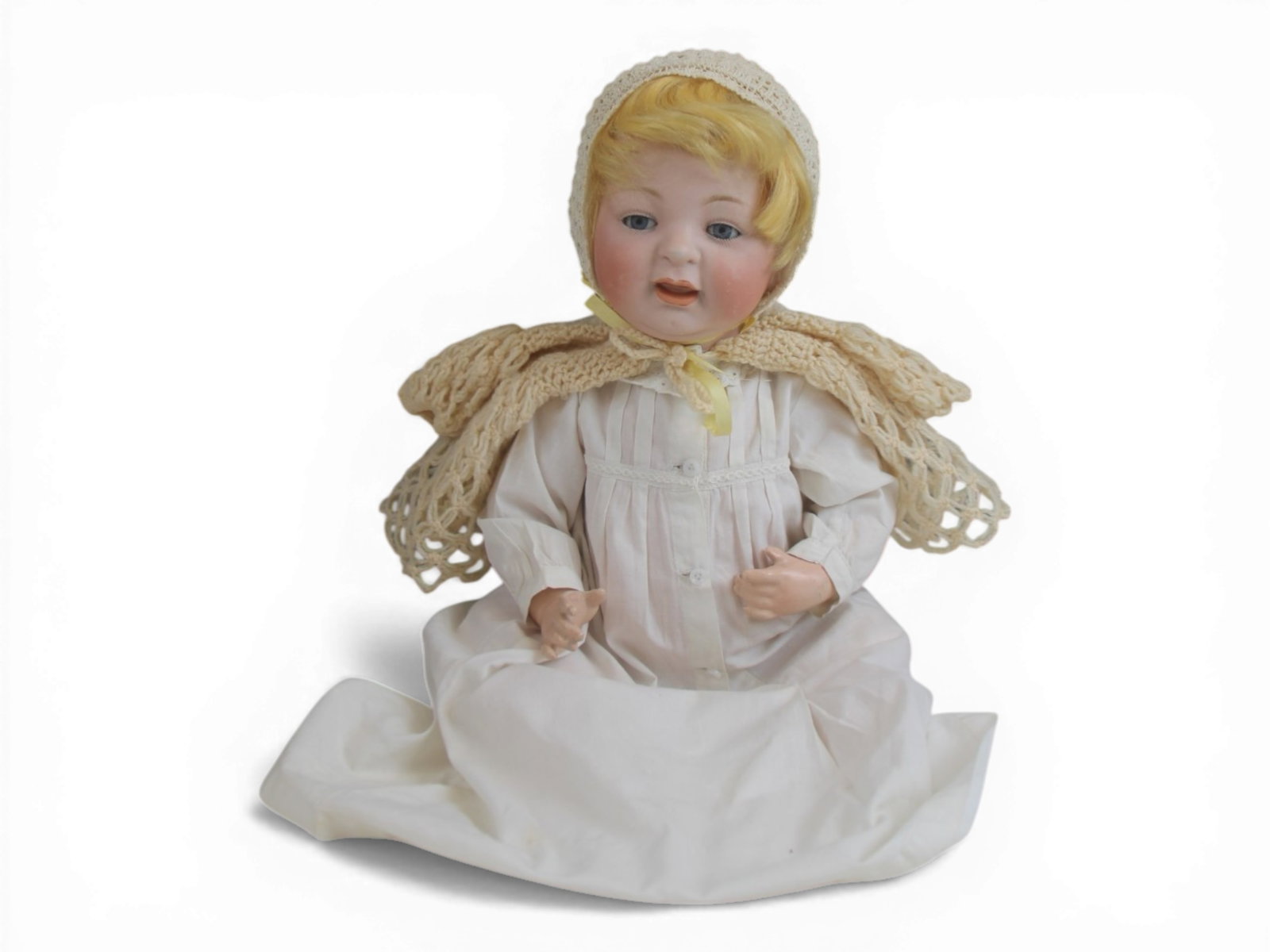 JD Kestner 211 Sammy Baby Doll: 16 inch bisque socket head on bent limb composition baby body. Circa 1920s. Shipping: Weiss Auctions offers full-service, in-house shipping for nearly all items in this auction. For a shipping quote,