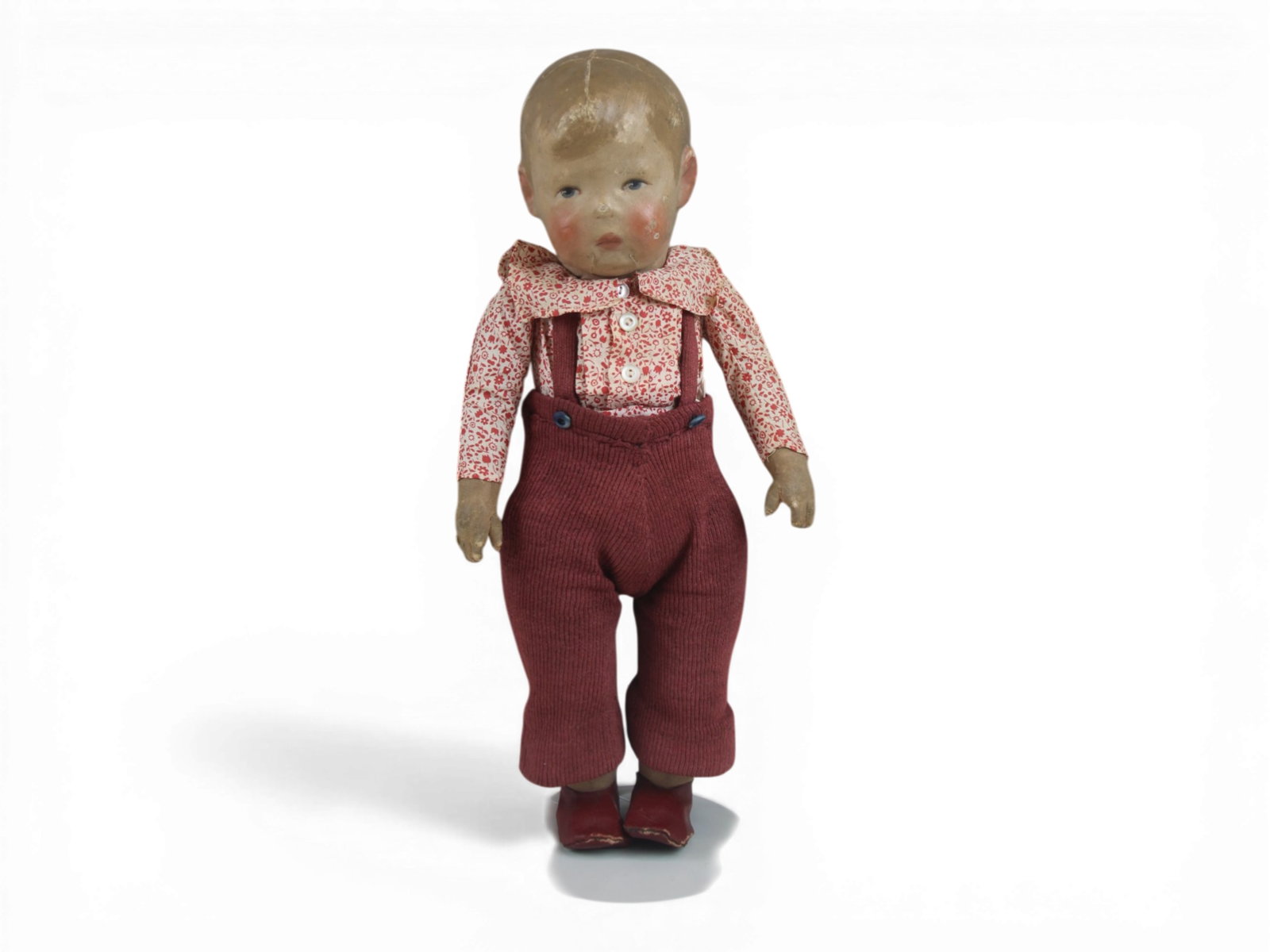 Kathe Kruse Doll Number I: 17 inch Kathe Kruse with painted oilcloth head on jointed cloth body, all original, signed on foot. Circa 1910. Very good condition. Shipping: Weiss Auctions offers full-service, in-house shipping for