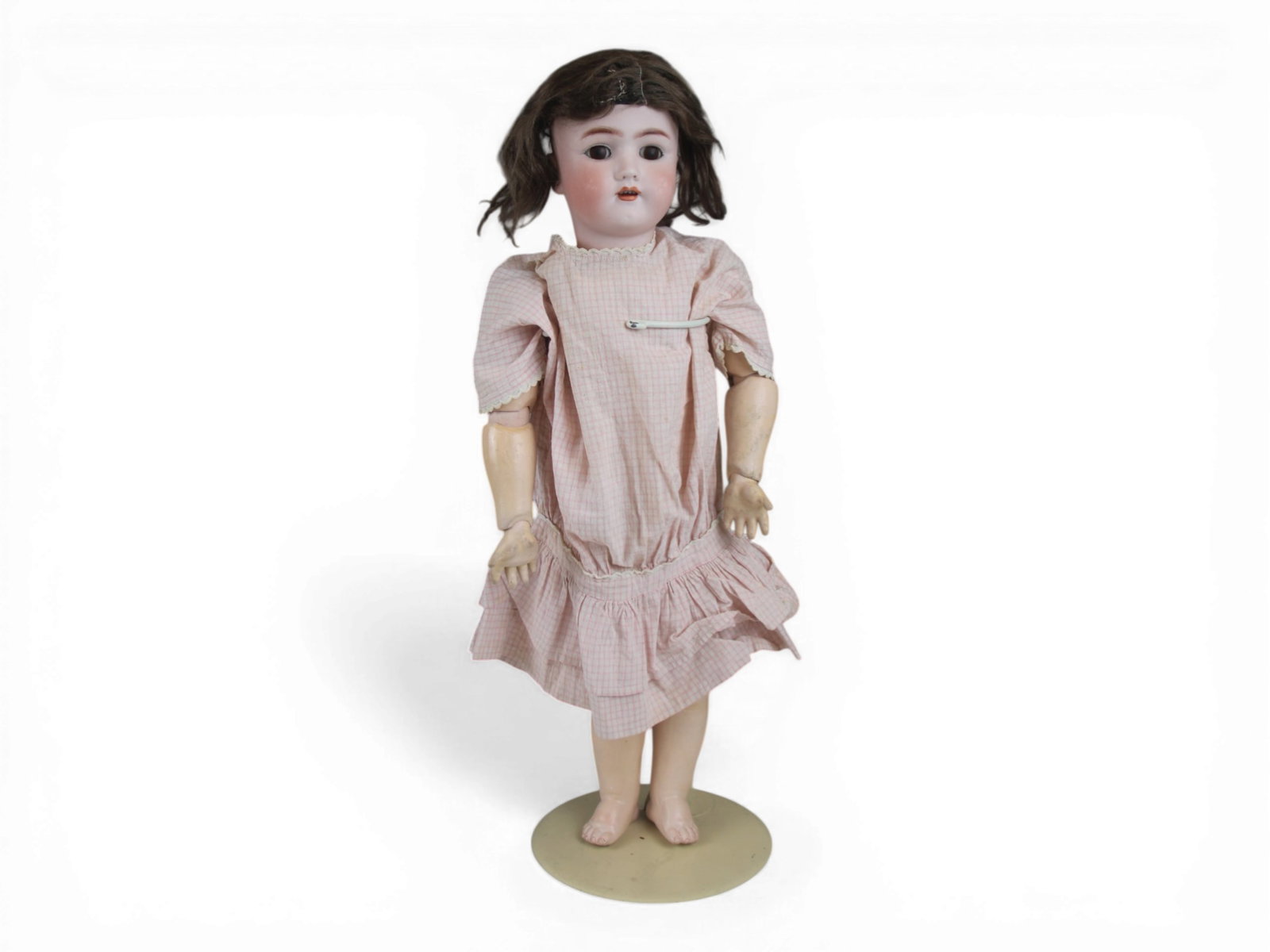 Handwerck / S&H Bisque Head Doll: 24 inch Heinrich Handwerck / Simon & Halbig bisque socket head on fully jointed composition and wood body with antique dress. Circa 1910. Shipping: Weiss Auctions offers full-service, in-house shippin