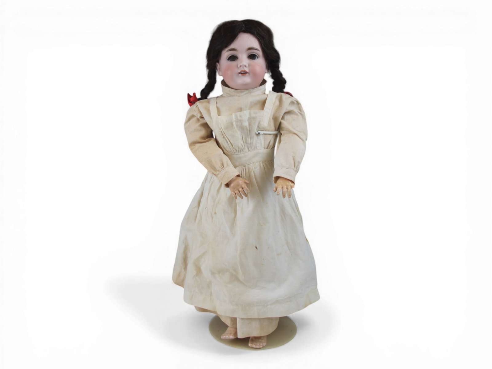 Kestner 164 Bisque Head Doll: 26 inch Kestner 164 bisque socket head on fully jointed composition and wood body with original wig and nurse costume. One finger broken. Circa 1890s. Shipping: Weiss Auctions offers full-service, in-