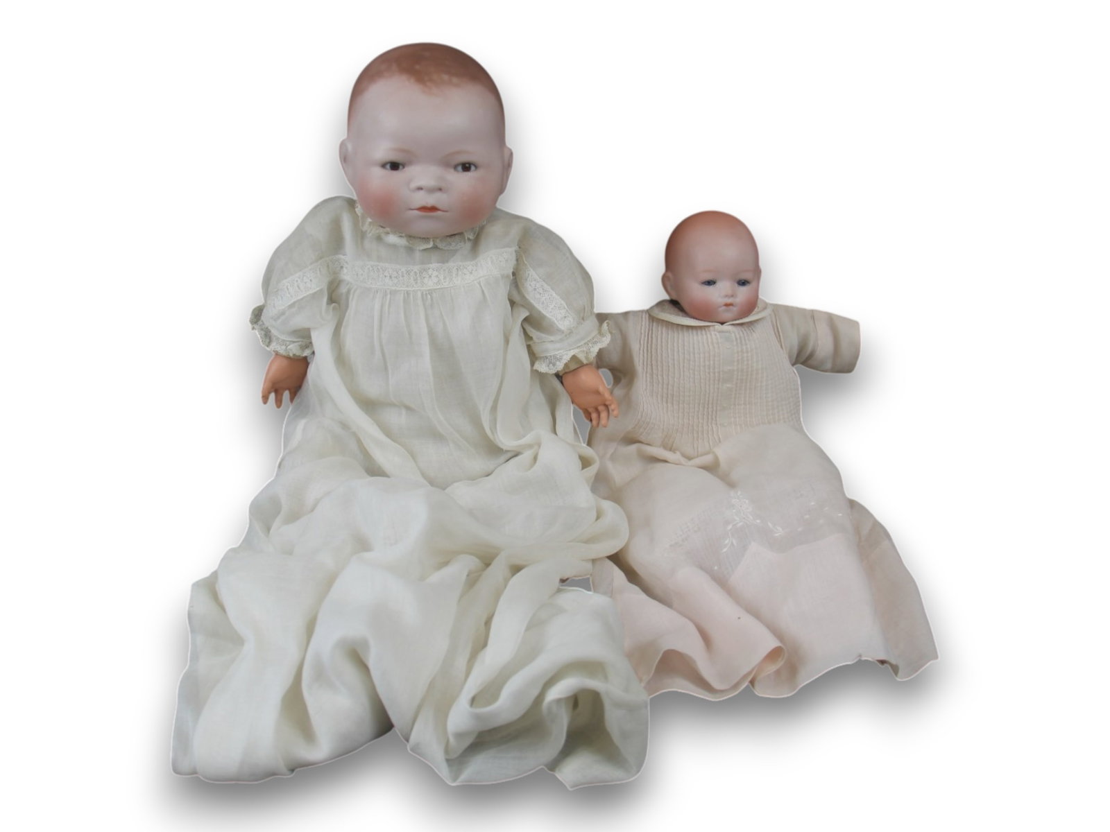 (2) Bye Lo and Baby Phyllis Dolls: 14 inch Bye Lo Baby by Grace Storey Putnam with bisque flange head on cloth frog body and celluloid hands, plus an 11 inch Armand Marseille Baby Phyllis with bisque flange head on cloth body with cell