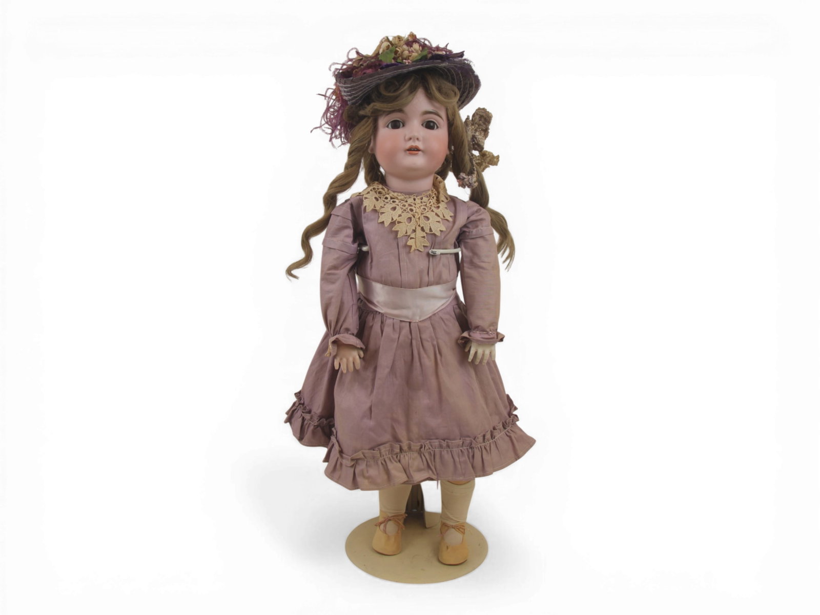 Kestner 164 Bisque Head Doll: 25.5 inch Kestner 164 bisque socket head on fully jointed original composition and wood body with original wig and lavender dress with matching hat. Circa 1890s. Shipping: Weiss Auctions offers full-s