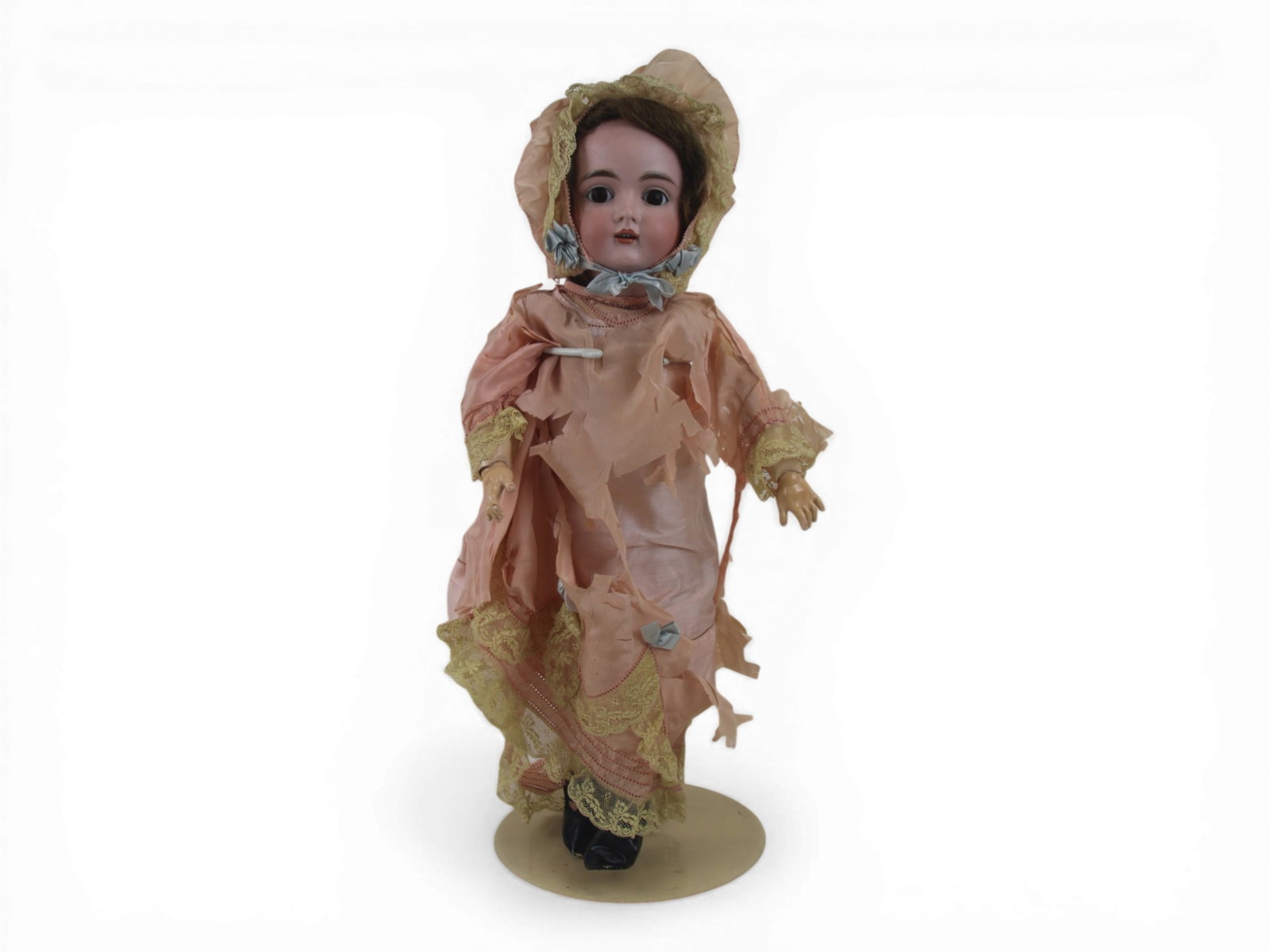 Kestner 167 Bisque Head Doll: 20 inch Kestner 167 bisque socket head on fully jointed composition and wood body, all original. Costume shredding noted. Circa 1900s. Shipping: Weiss Auctions offers full-service, in-house shipping f