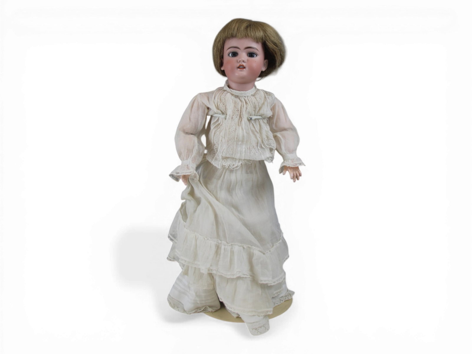 S&H 1079 Bisque Head Doll: 21 inch Simon & Halbig 1079 bisque socket head on fully jointed composition and wood body, all original. Circa 1890s. Shipping: Weiss Auctions offers full-service, in-house shipping for nearly all ite