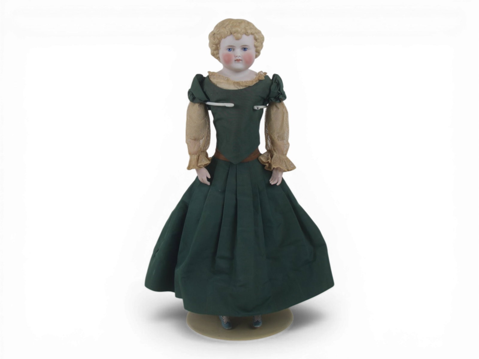 Tinted Bisque Shoulder Head 890 X 0 Doll: 21 inch tinted bisque shoulder head closed mouth with molded hair and painted eyes on cloth body with bisque arms and bisque or porcelain lower legs. One finger broken. Circa 1890. Shipping: Weiss Auc