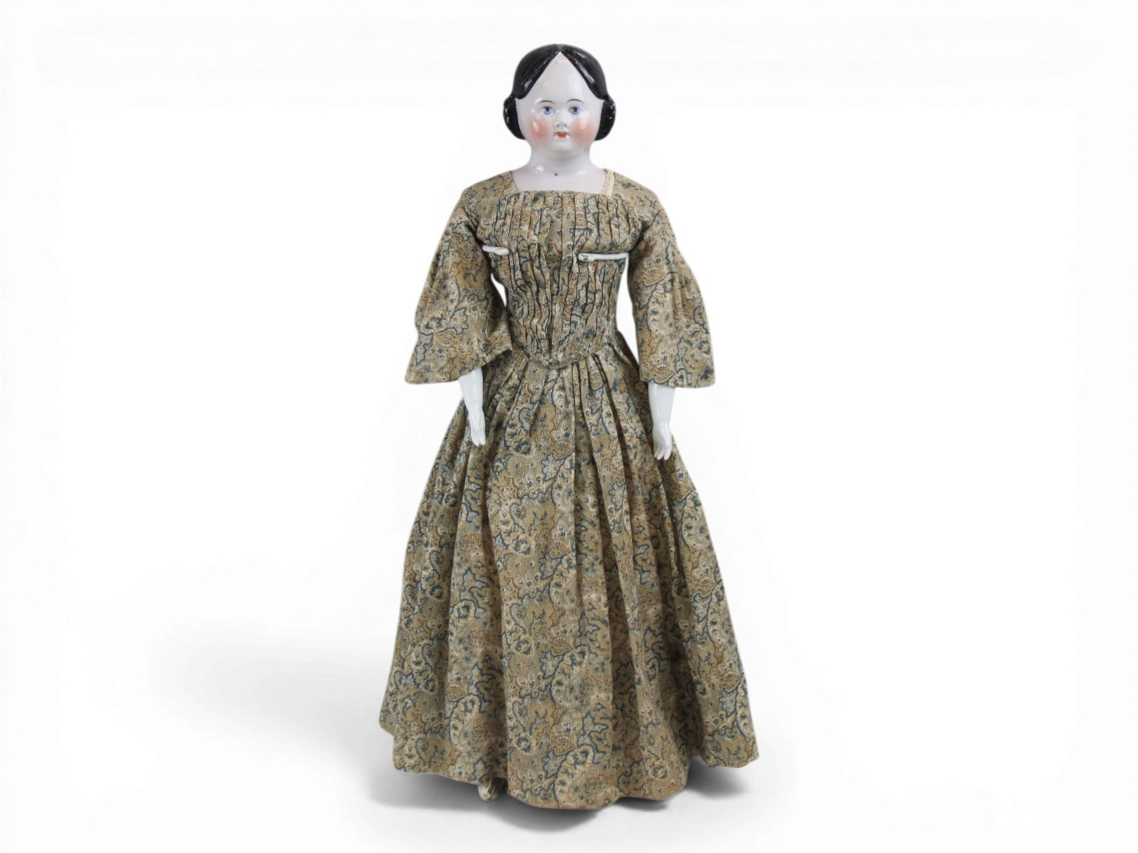 Pink Tinted China Head Lady Doll: 26 inch pink tinted china shoulder head lady with molded hair and painted eyes on cloth body with replaced china arms. Covered Wagon hairstyle. Circa 1850. Shipping: Weiss Auctions offers full-service