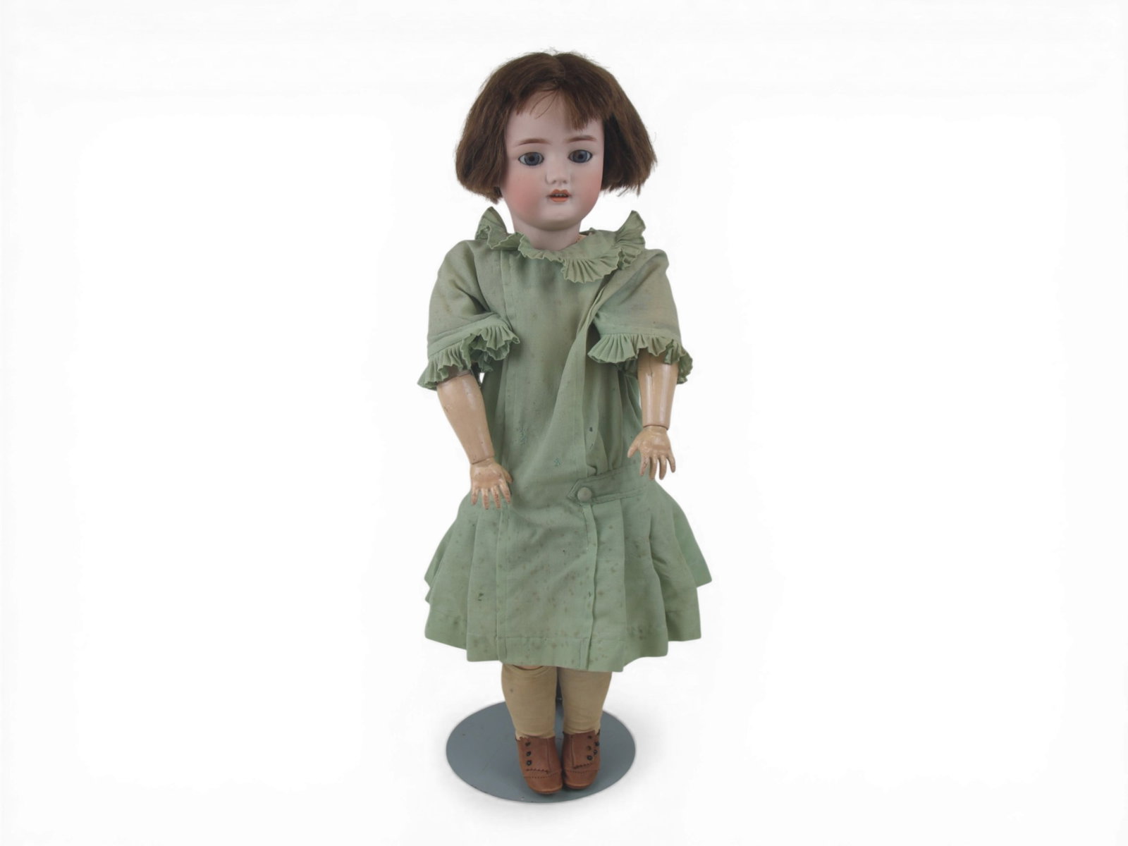 C.M. Bergmann Bisque Head Doll: 28 inch C.M. Bergmann bisque socket head on fully jointed composition and wood body, all original. Wear to eyelids noted. Circa 1915. Shipping: Weiss Auctions offers full-service, in-house shipping fo