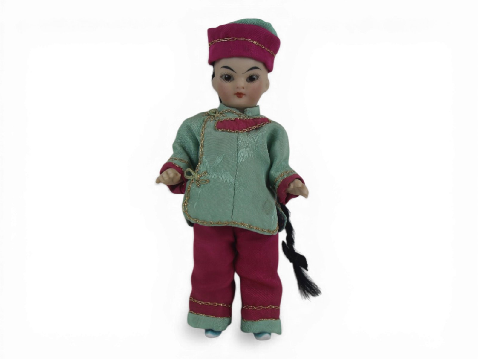 German All Bisque Asian Doll: 6 inch German all bisque Asian doll in newer Asian costume. Circa 1900. Shipping: Weiss Auctions offers full-service, in-house shipping for nearly all items in this auction. For a shipping quote, plea