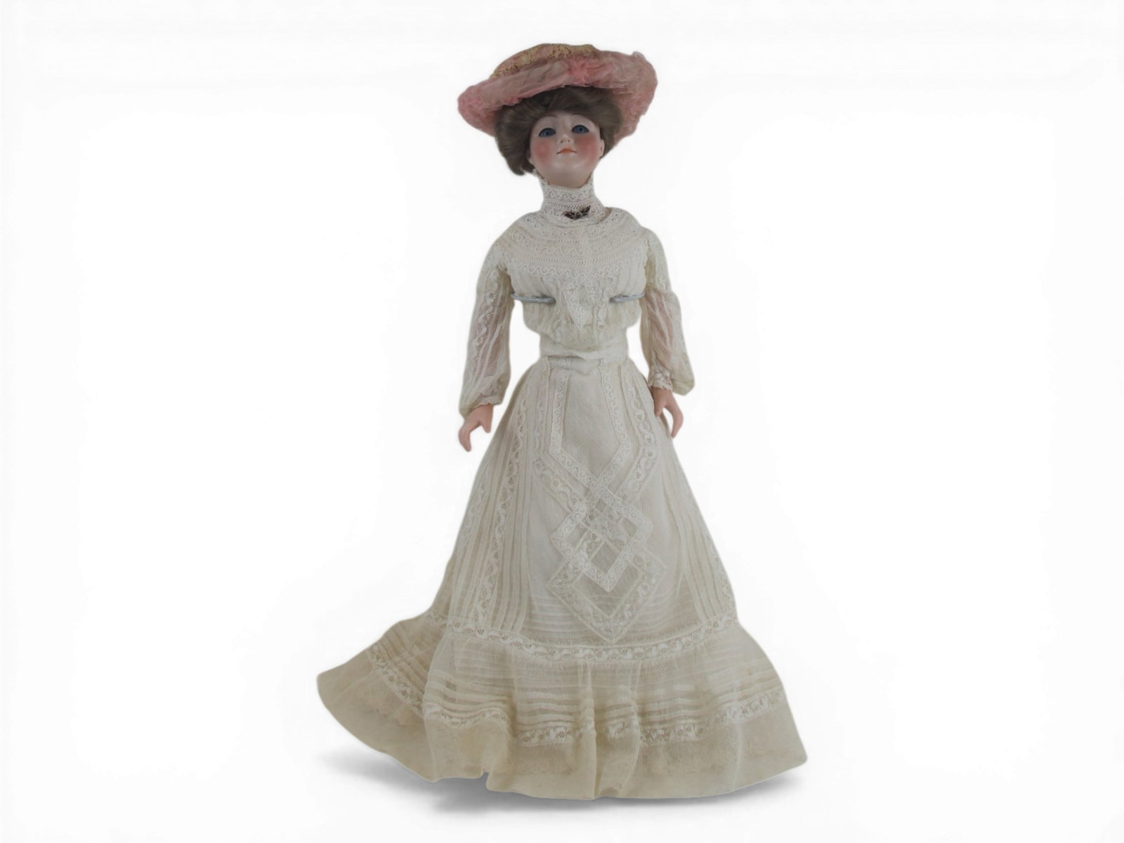 Kestner 172 Gibson Girl Doll: 21 inch Kestner No. 172 Gibson Girl with bisque shoulder head on pin jointed kidskin body. Original lady dress. Circa 1915. Shipping: Weiss Auctions offers full-service, in-house shipping for nearly a