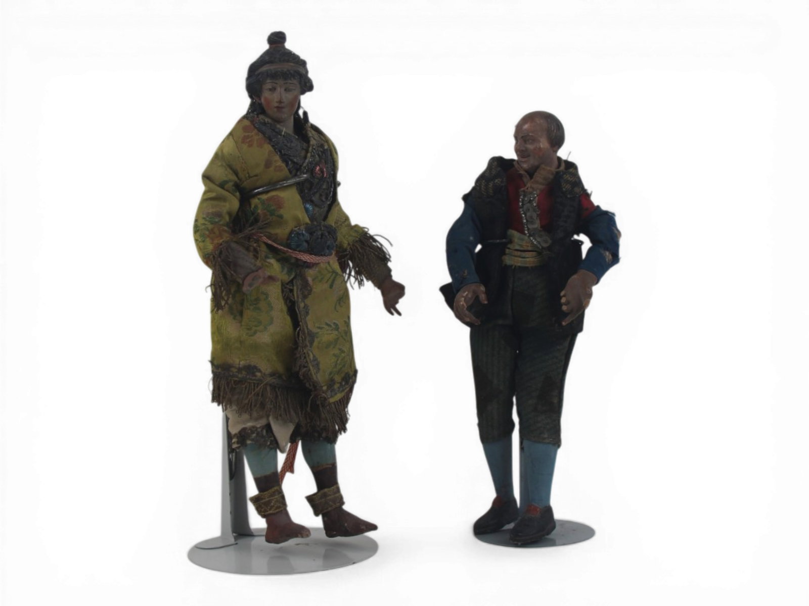 (2) Italian Creche Figures: Two Italian terra cotta creche figures measuring 12 and 10 inches with original costumes. Damage to fingers on both. Circa 1700-1800. Shipping: Weiss Auctions offers full-service, in-house shipping fo