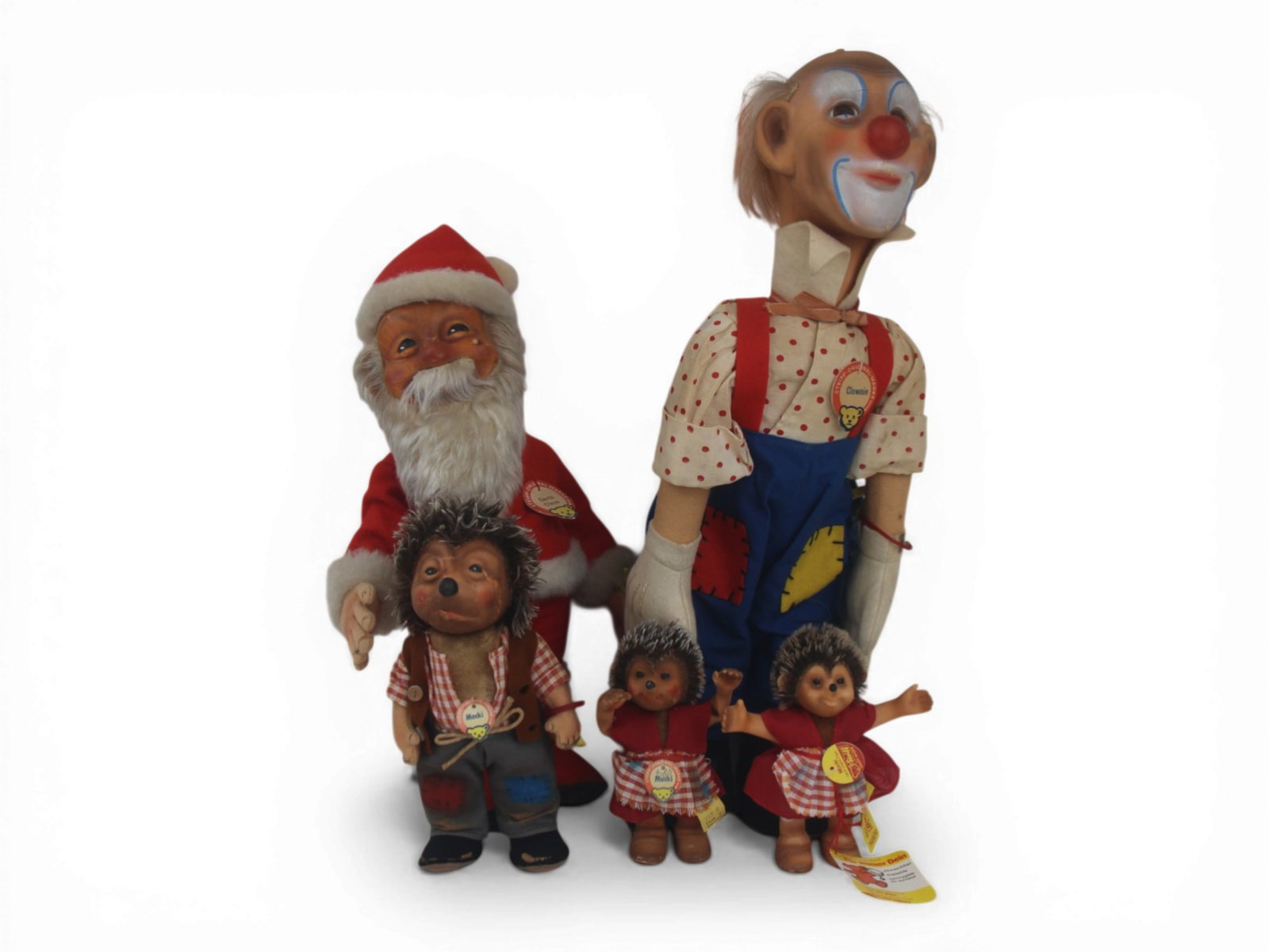 (5) Steiff Dolls: Group of five Steiff dolls ranging from 16 to 5 inches with vinyl and cloth bodies, all original and tagged. Circa 1960s. Shipping: Weiss Auctions offers full-service, in-house shipping for nearly all