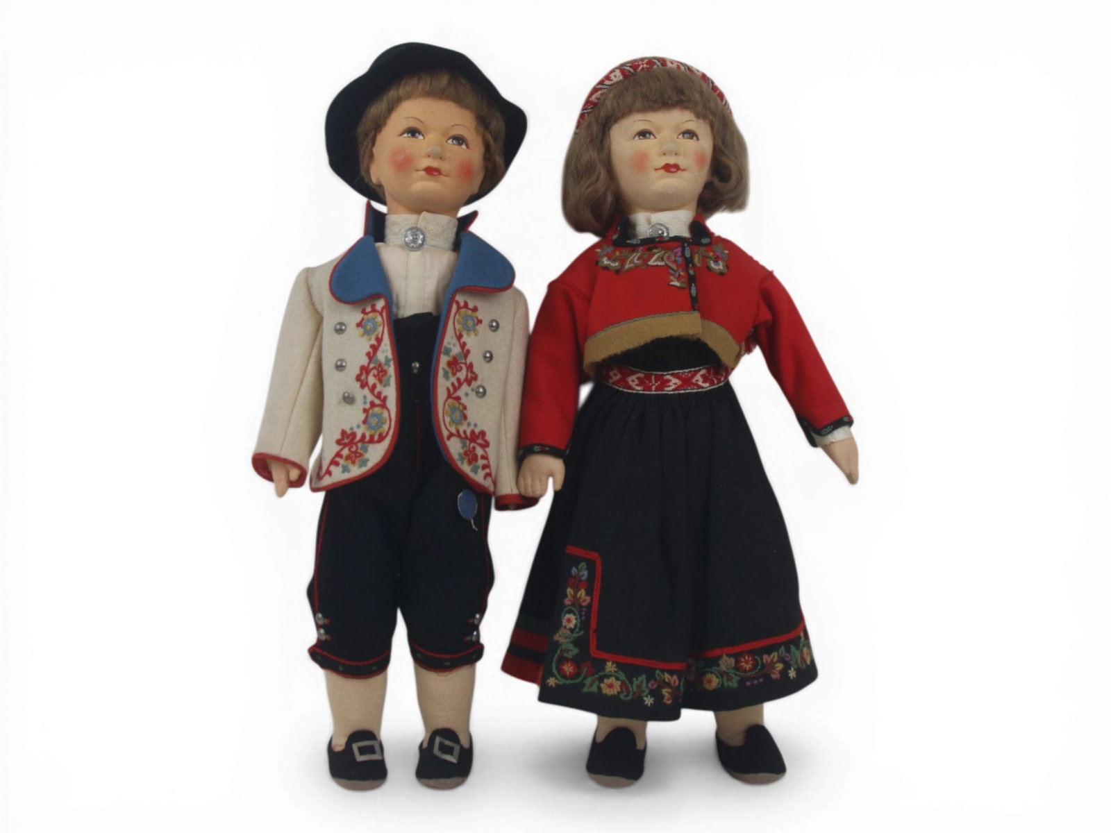 (2) Ronnaug Petterssen Felt Dolls: Pair of 18 inch Norwegian all felt dolls in regional costumes by Ronnaug Petterssen. All original. Circa 1940s. Shipping: Weiss Auctions offers full-service, in-house shipping for nearly all items in 