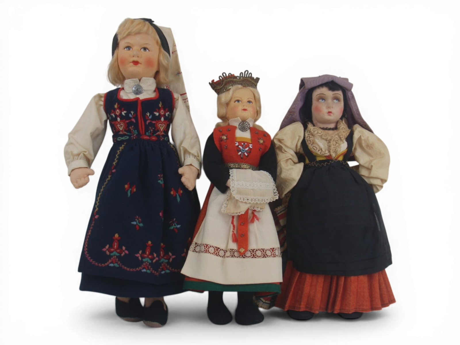 (3) Souvenir Felt Dolls: Group of three dolls measuring 14.5 to 12 inches, largest tagged Ronnaug Petterssen, all felt with regional costumes. Circa 1940s. Shipping: Weiss Auctions offers full-service, in-house shipping for n