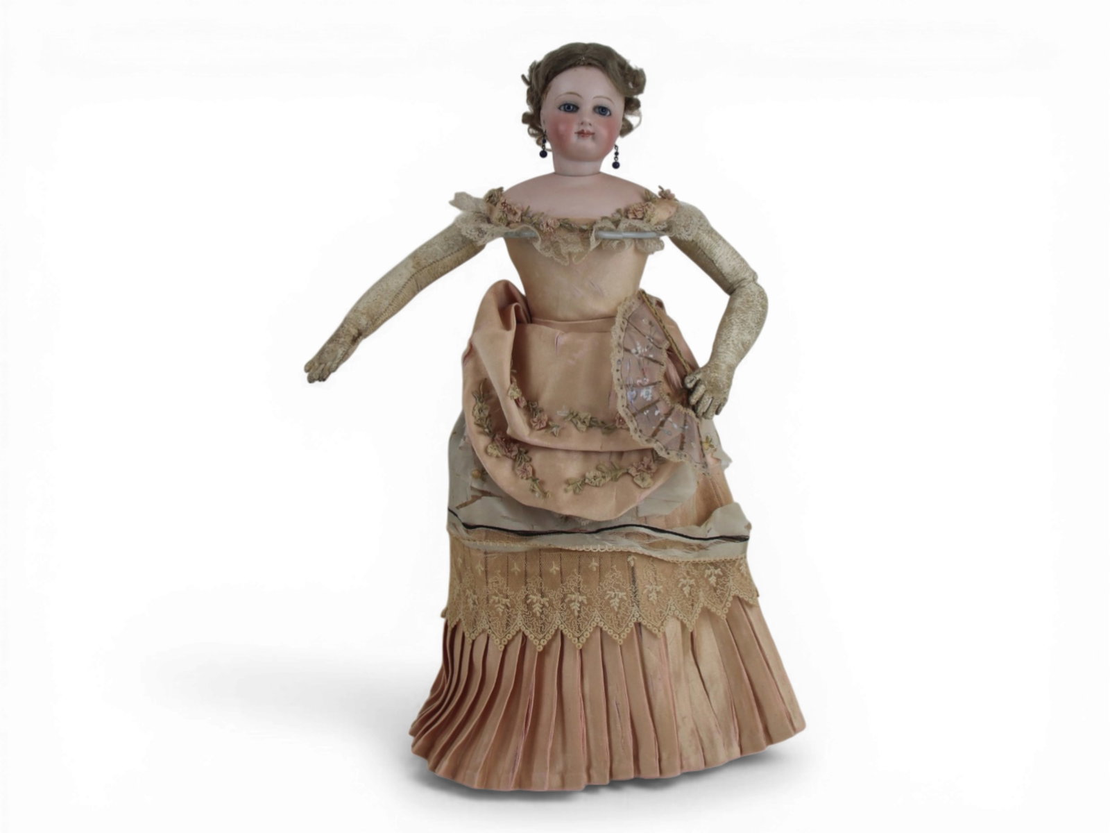 French Fashion Doll (Attributed Jumeau): 15 inch French fashion doll attributed to Jumeau with bisque socket head on bisque shoulder plate and kidskin body with kid arms and legs. Original dress showing wear, original wig, closed mouth, blue