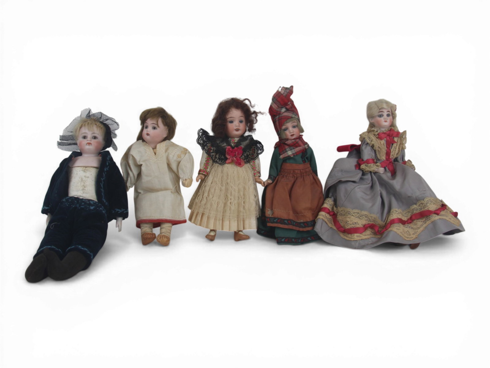 (5) German Bisque Head Dolls: Five German bisque head dolls measuring 11 to 8 inches including two shoulder heads on kid bodies and three socket heads on composition bodies. Circa 1900-1920. Shipping: Weiss Auctions offers