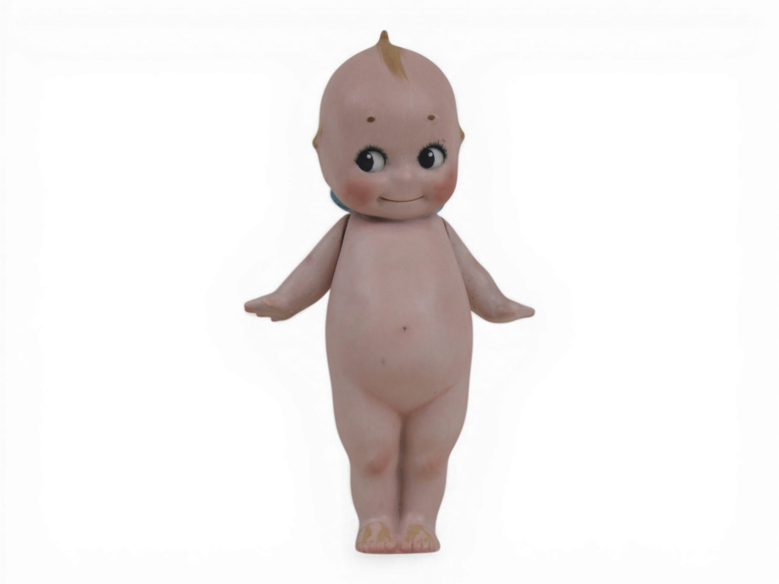 Rose O'Neill Kewpie All Bisque Doll: 9 inch all bisque Kewpie doll with jointed arms and signature on feet. Circa 1913-1923. Shipping: Weiss Auctions offers full-service, in-house shipping for nearly all items in this auction. For a ship