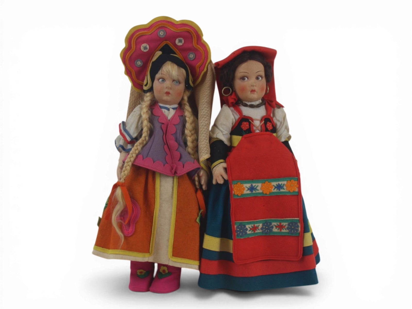 (2) Italian Lenci Dolls: Two Italian Lenci felt dolls measuring 14 inches with original regional costumes. Circa 1930. Shipping: Weiss Auctions offers full-service, in-house shipping for nearly all items in this auction. For 