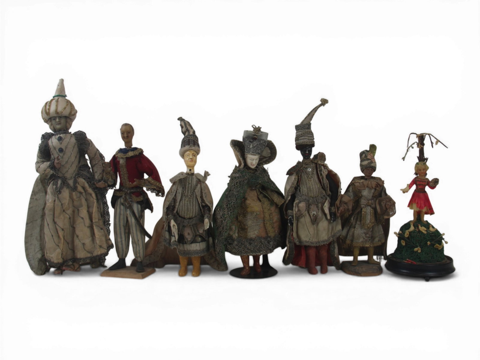 (7) European Creche Figures: Seven creche figures measuring 12 to 8 inches including wax examples on wire armatures and composition figures in period costumes. Early 18th century. Shipping: Weiss Auctions offers full-service, in-