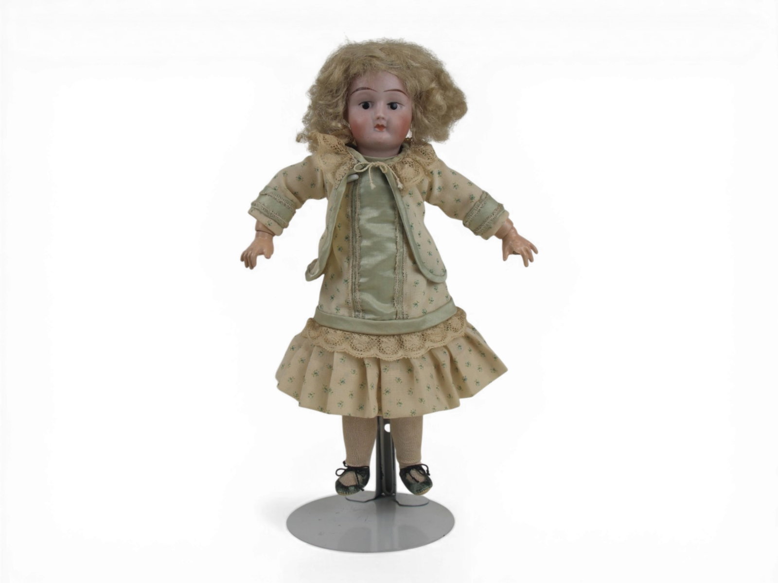 French Montreuil Doll: 12 inch French Montreuil bisque socket head doll on fully jointed composition body. Circa 1915. Shipping: Weiss Auctions offers full-service, in-house shipping for nearly all items in this auction. Fo