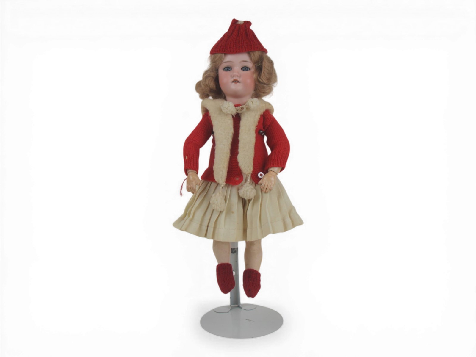 German Bisque Head Doll: 13 inch bisque socket head doll on fully jointed composition body with costume. Circa 1900-1910. Shipping: Weiss Auctions offers full-service, in-house shipping for nearly all items in this auction. F