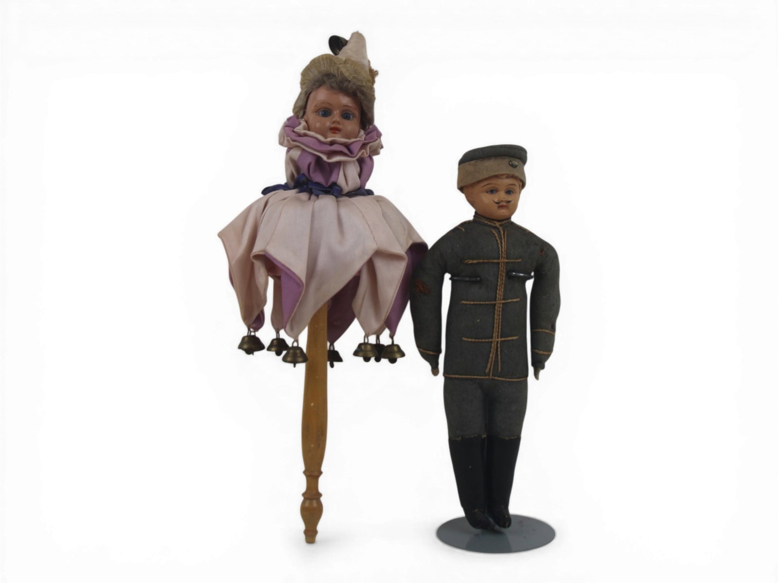 (2) Celluloid Head Dolls: Celluloid head marotte jester with musical mechanism and a 9.5 inch Prussian soldier doll with felt body in original costume. Circa 1890-1905. Shipping: Weiss Auctions offers full-service, in-house sh